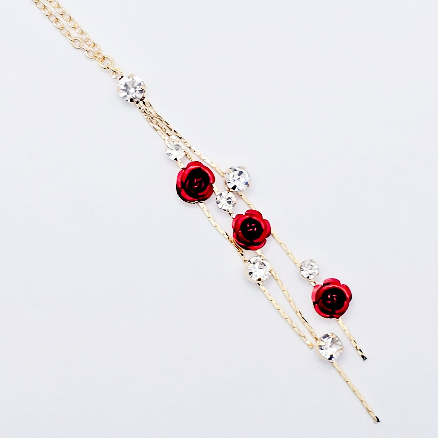 18K Gold Fake Piercing Nipple Chain Necklace with Red Roses Backdrop and Your Choice of Nipple Attachment.