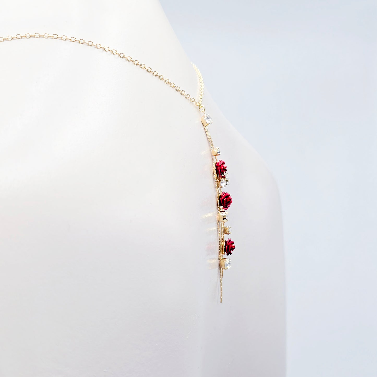 18K Gold Fake Piercing Nipple Chain Necklace with Red Roses Backdrop and Your Choice of Nipple Attachment.