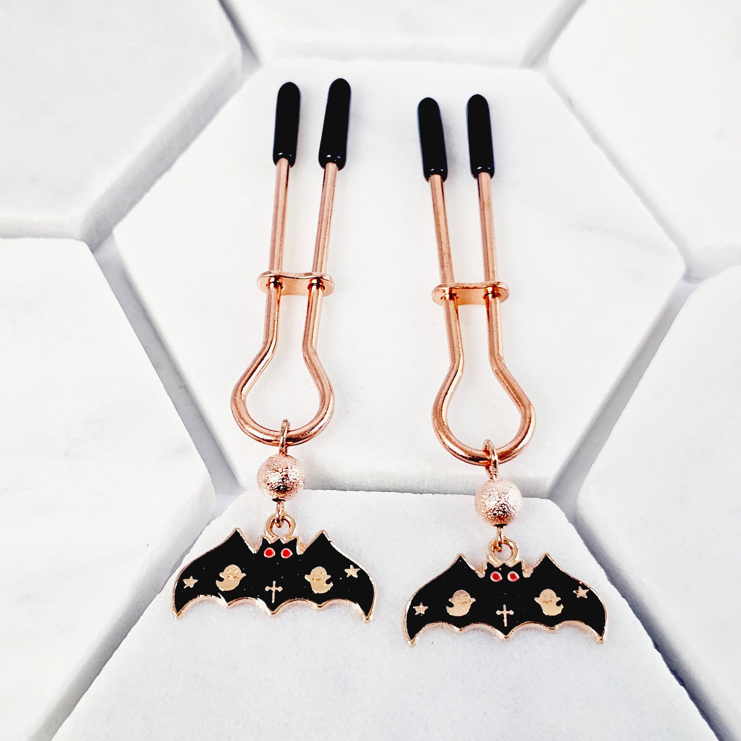 Spooky Nipple Clamps for Halloween. Rose Gold Straight Tweezer Clamps with Bats.