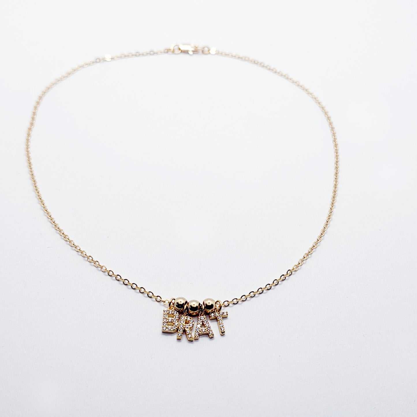 BDSM Brat Necklace. 18K Gold Discreet Day Collar for Sub with Sparkling CZ BRAT Pendants.