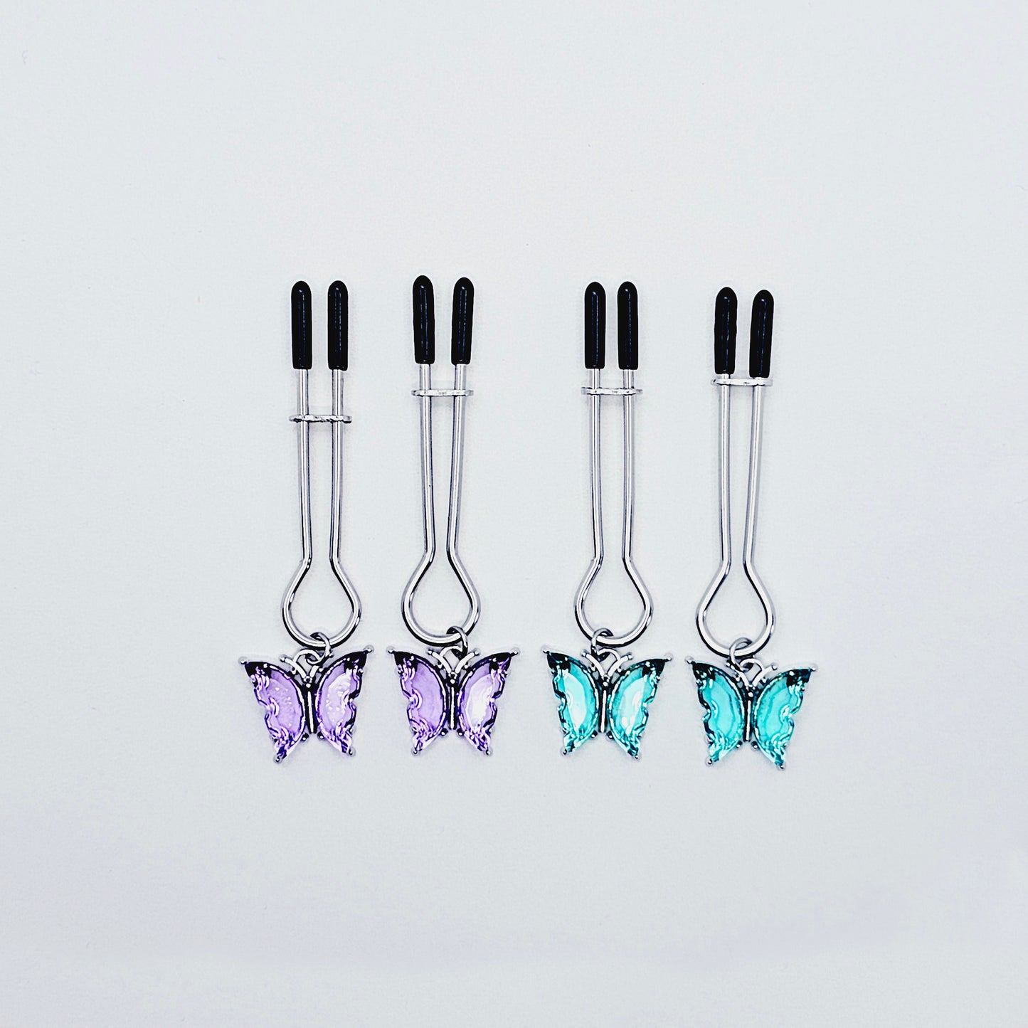 Nipple Clamps with Purple or Teal Butterflies. Adjustable Straight Tweezer Clamps.