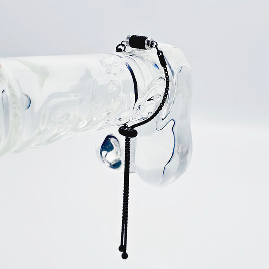 Penis Chain Noose Bracelet. Black Stainless Steel Adjustable Bolo Style Cock Ring with Stimulating Barrel Roller