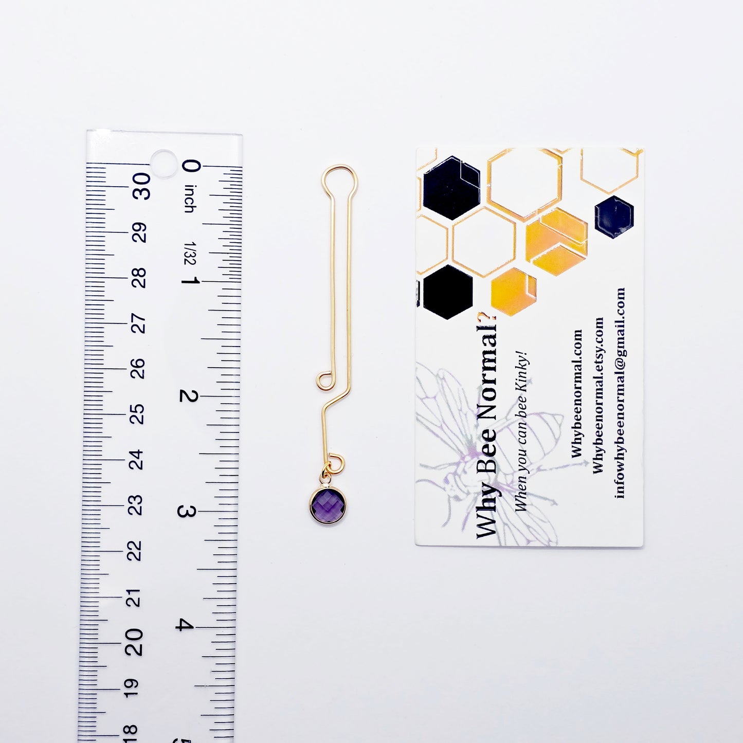 Labia Clip with Purple Crystal. Gold