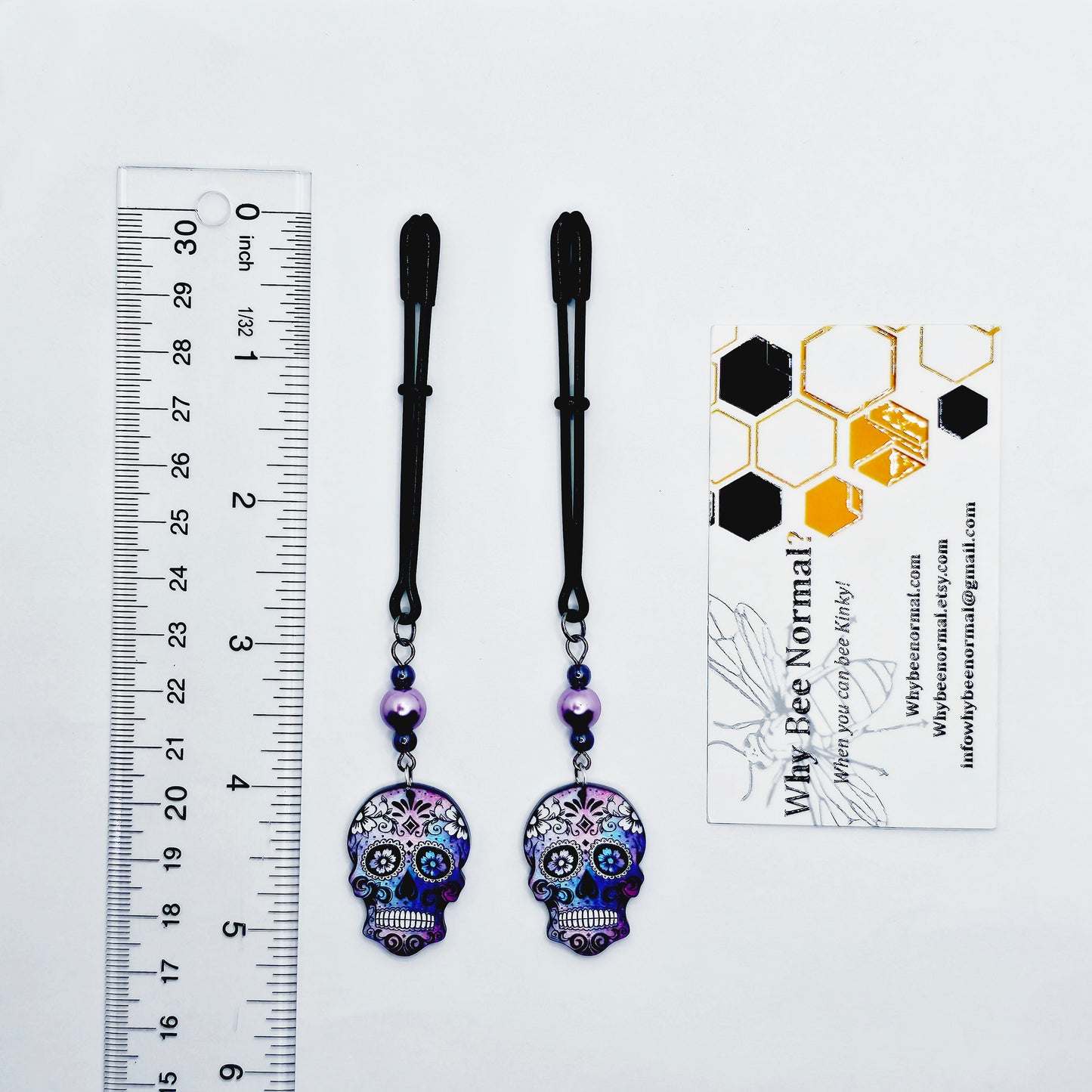 Sugar Skull Nipple Clamps. Black Tweezer Nipple Clamps with Pretty Pearl Beads and Skulls.
