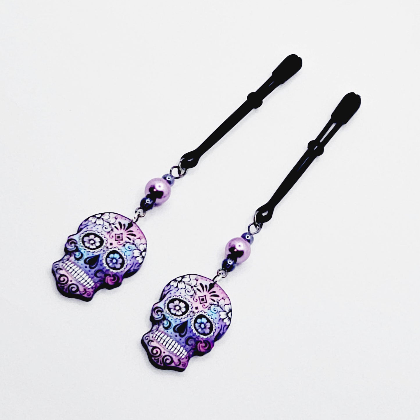 Sugar Skull Nipple Clamps. Black Tweezer Nipple Clamps with Pretty Pearl Beads and Skulls.