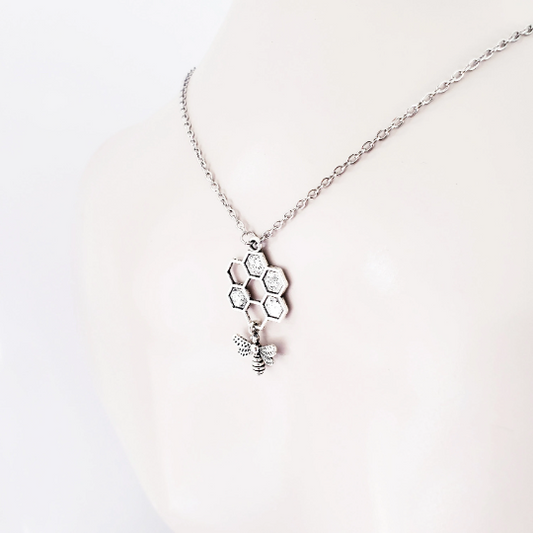 Bee and Honeycomb Backdrop Necklace to Nipple