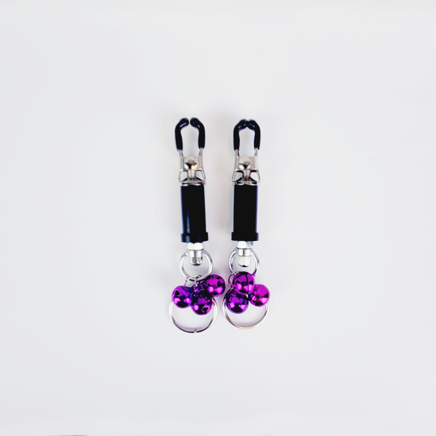BDSM Nipple Clamps. Barrel Nipple Clamps with Bells and Pull Rings. MATURE