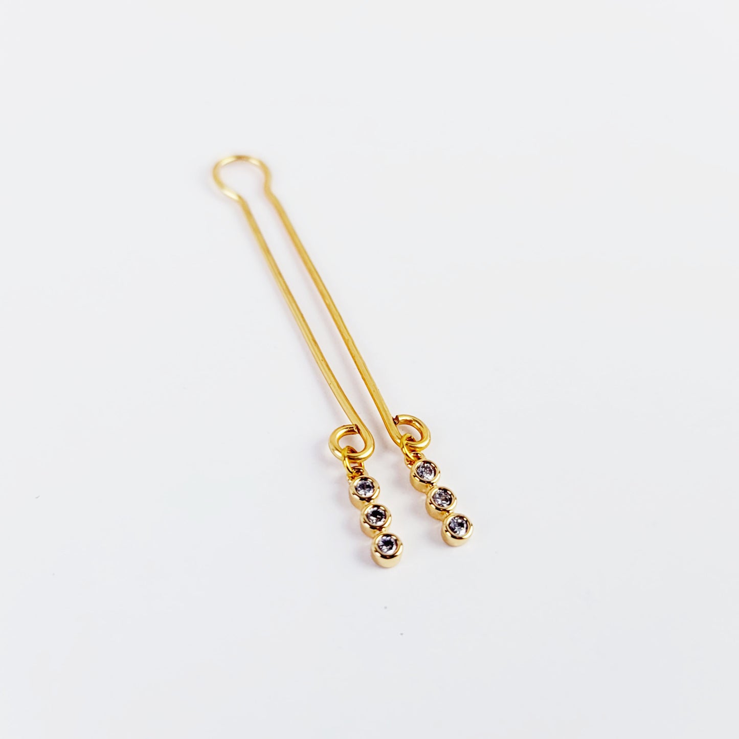 Gold Labia Clip and Horseshoe Style Nipple Rings with 18k Gold Tri Circle Gems.