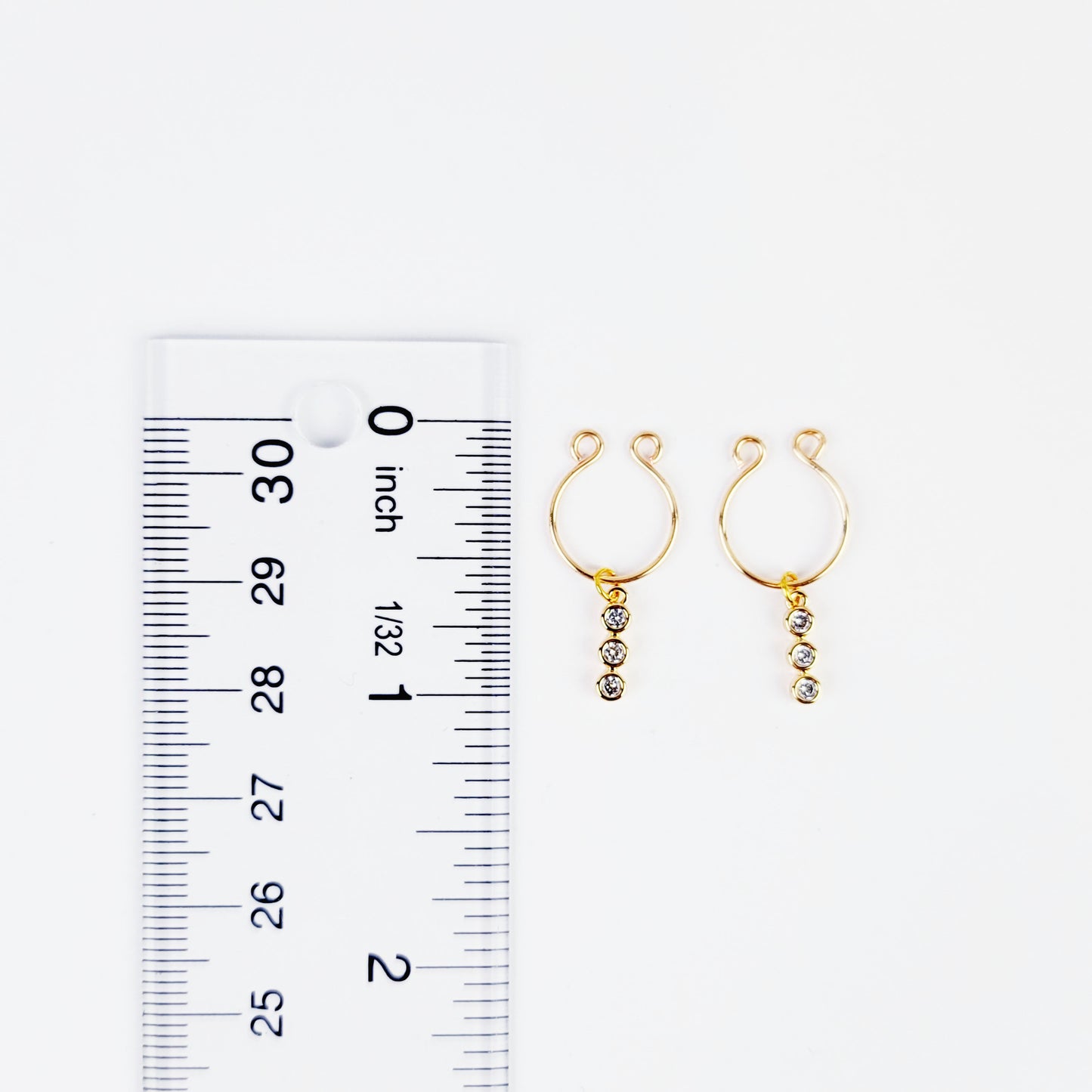 Gold Labia Clip and Horseshoe Style Nipple Rings with 18k Gold Tri Circle Gems.
