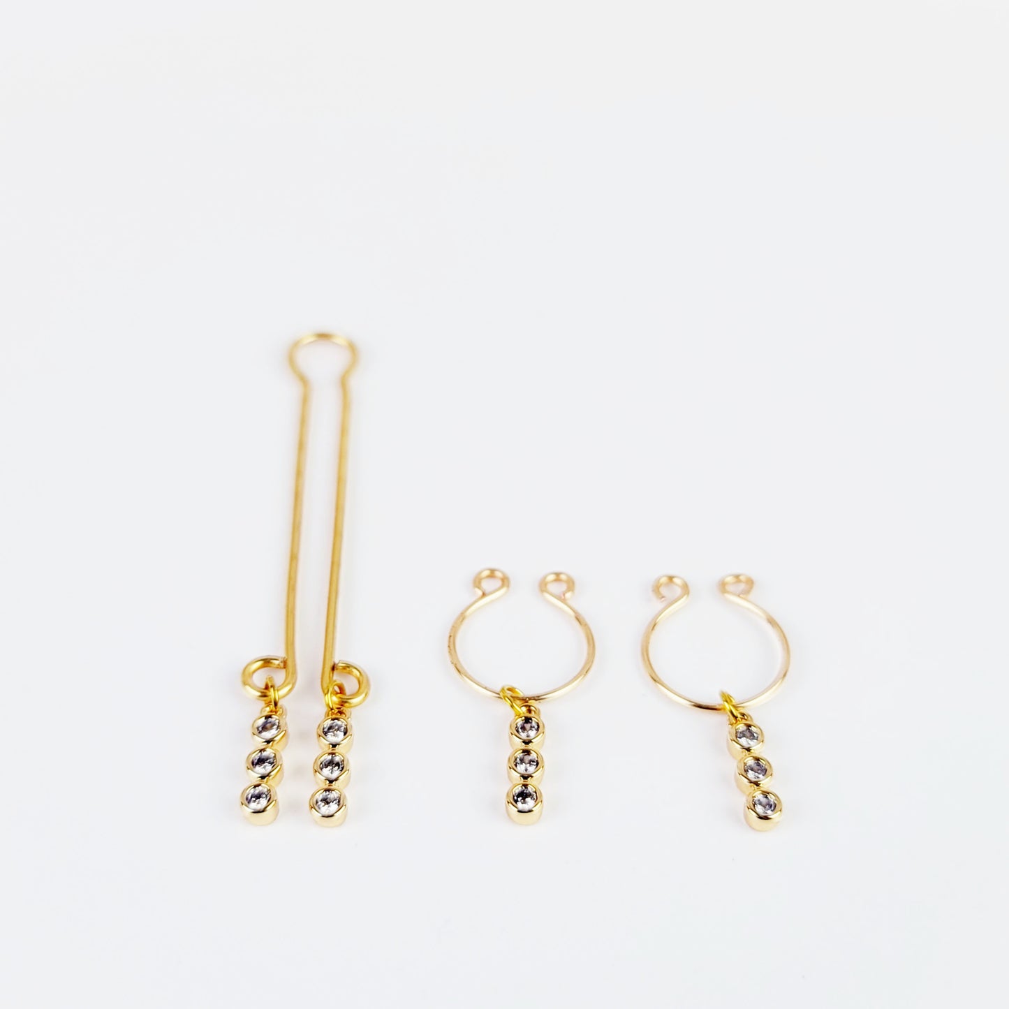 Gold Labia Clip and Horseshoe Style Nipple Rings with 18k Gold Tri Circle Gems.