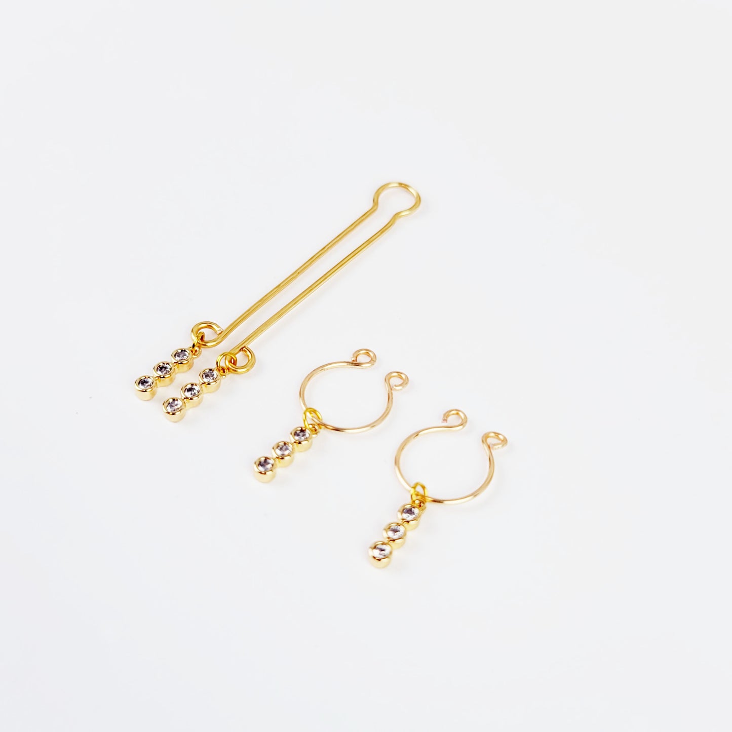 Gold Labia Clip and Horseshoe Style Nipple Rings with 18k Gold Tri Circle Gems.