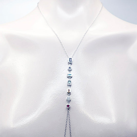 Platinum Necklace with Nipple Chains and Gemstones, with Nipple Nooses, on a mannequin against a white background.