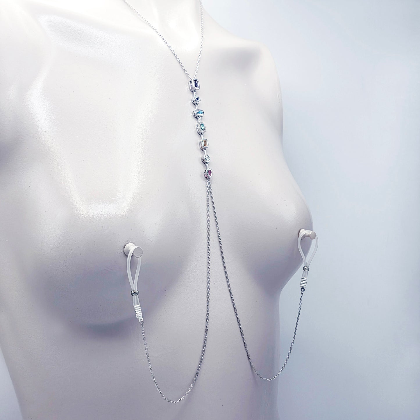 Platinum Necklace with Nipple Chains and Gemstones, with Nipple Nooses, on a mannequin against a white background.