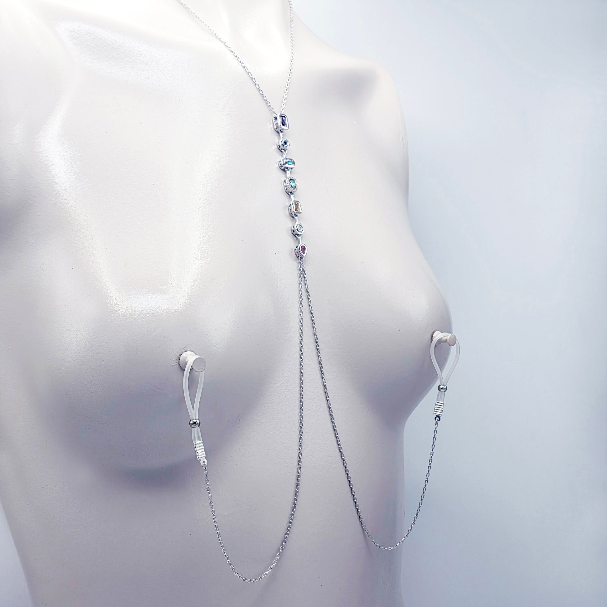 Platinum Necklace with Nipple Chains and Gemstones, with Nipple Nooses, on a mannequin against a white background.