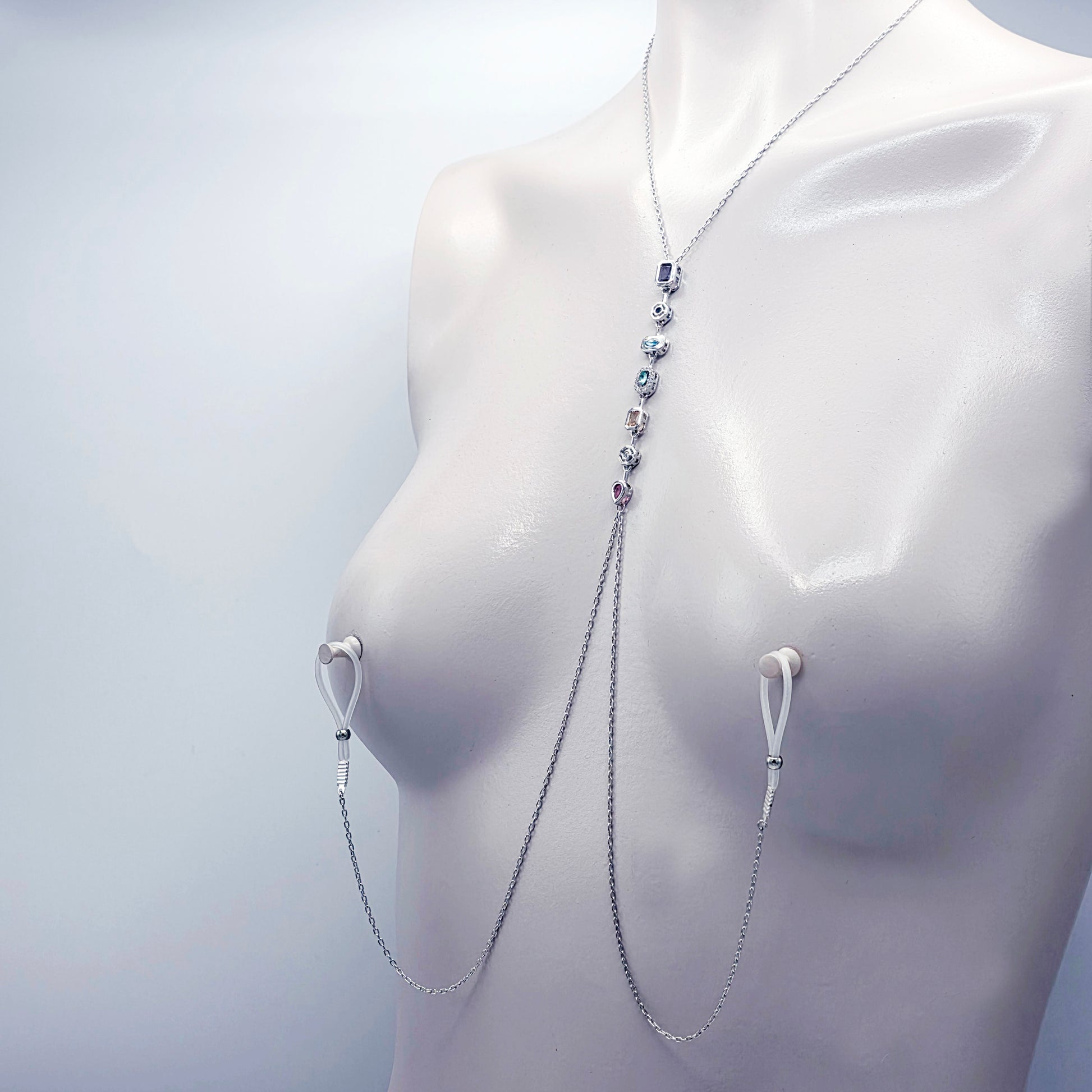 Platinum Necklace with Nipple Chains and Gemstones, with Nipple Nooses, on a mannequin against a white background.