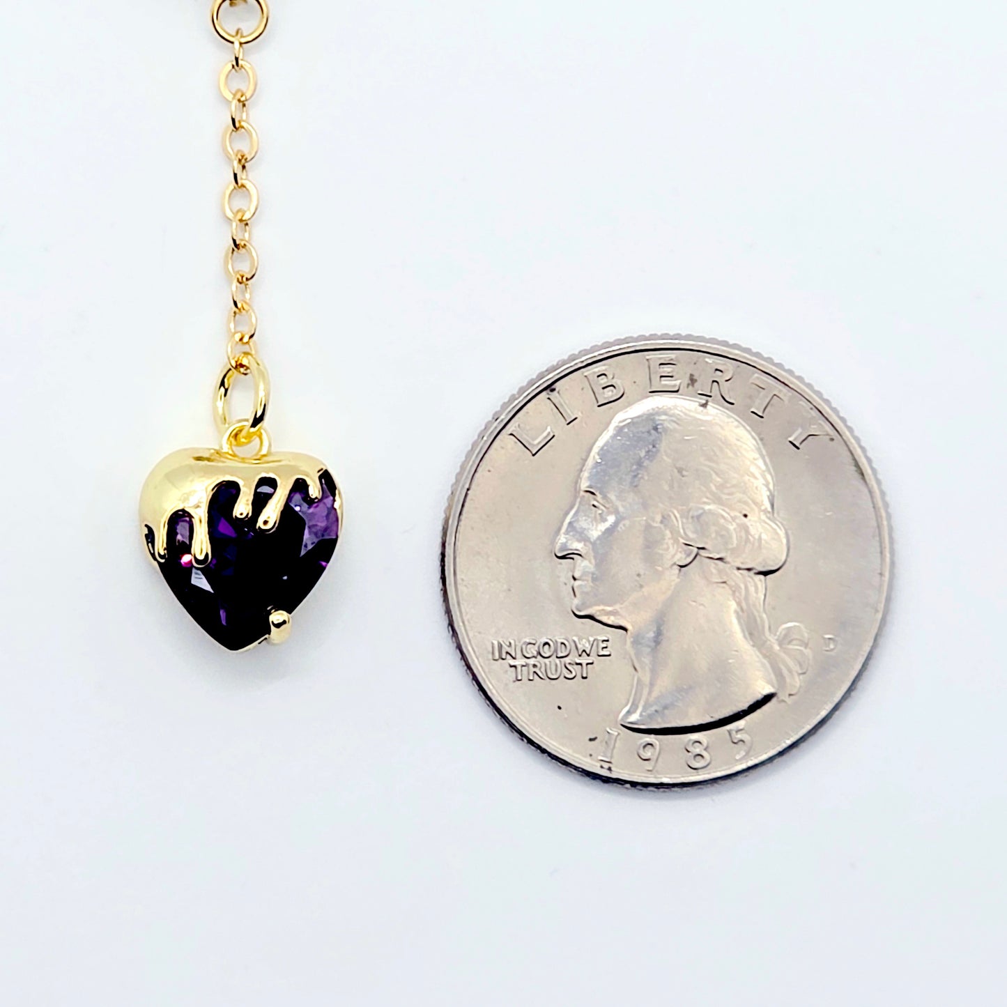 heart-shaped purple gem on gold chain and round pinch clasp VCH Clip