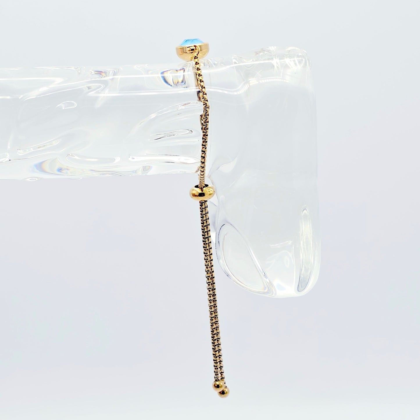 Gold Penis Noose Bracelet with Blue Gemstone