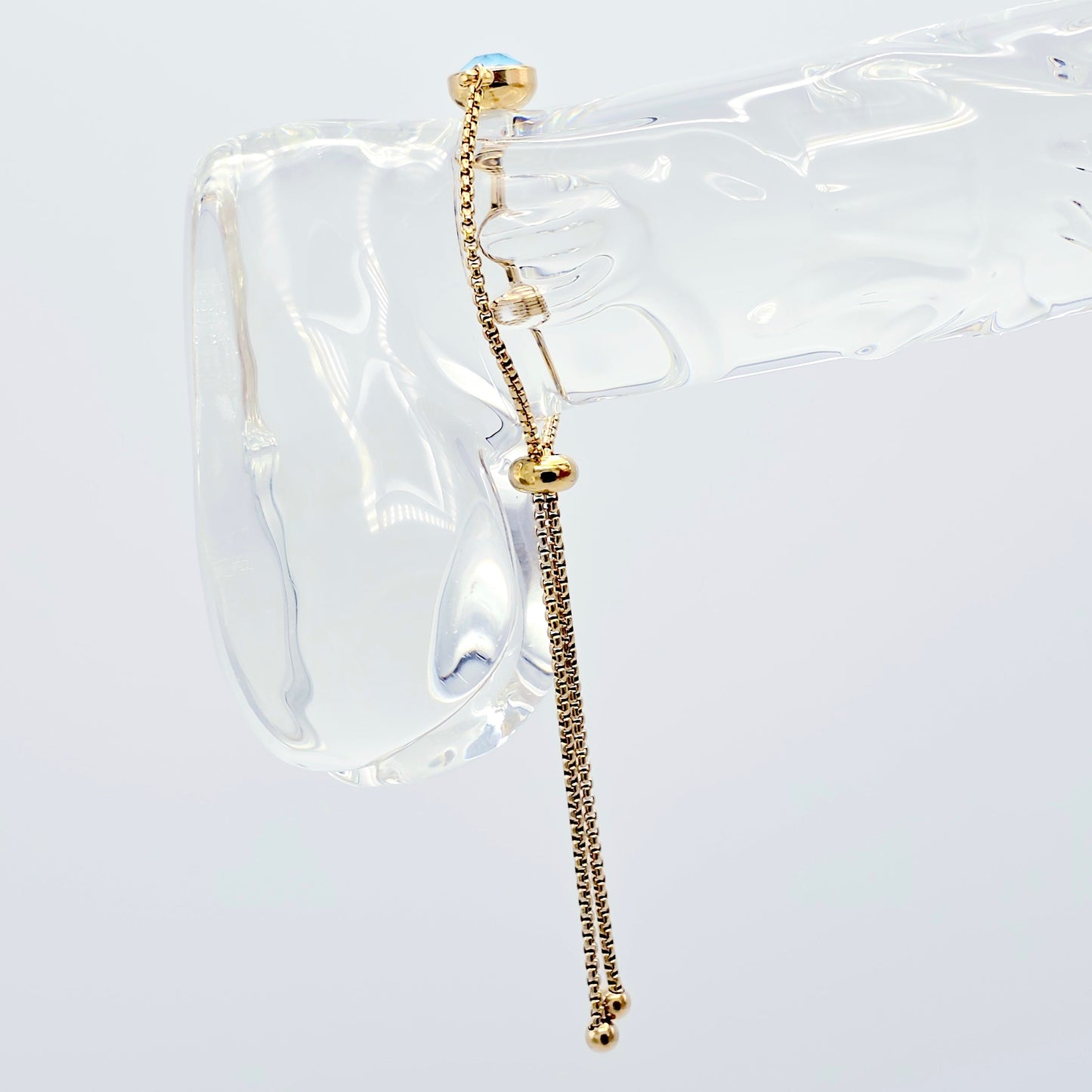 Gold Penis Noose Bracelet with Blue Gemstone