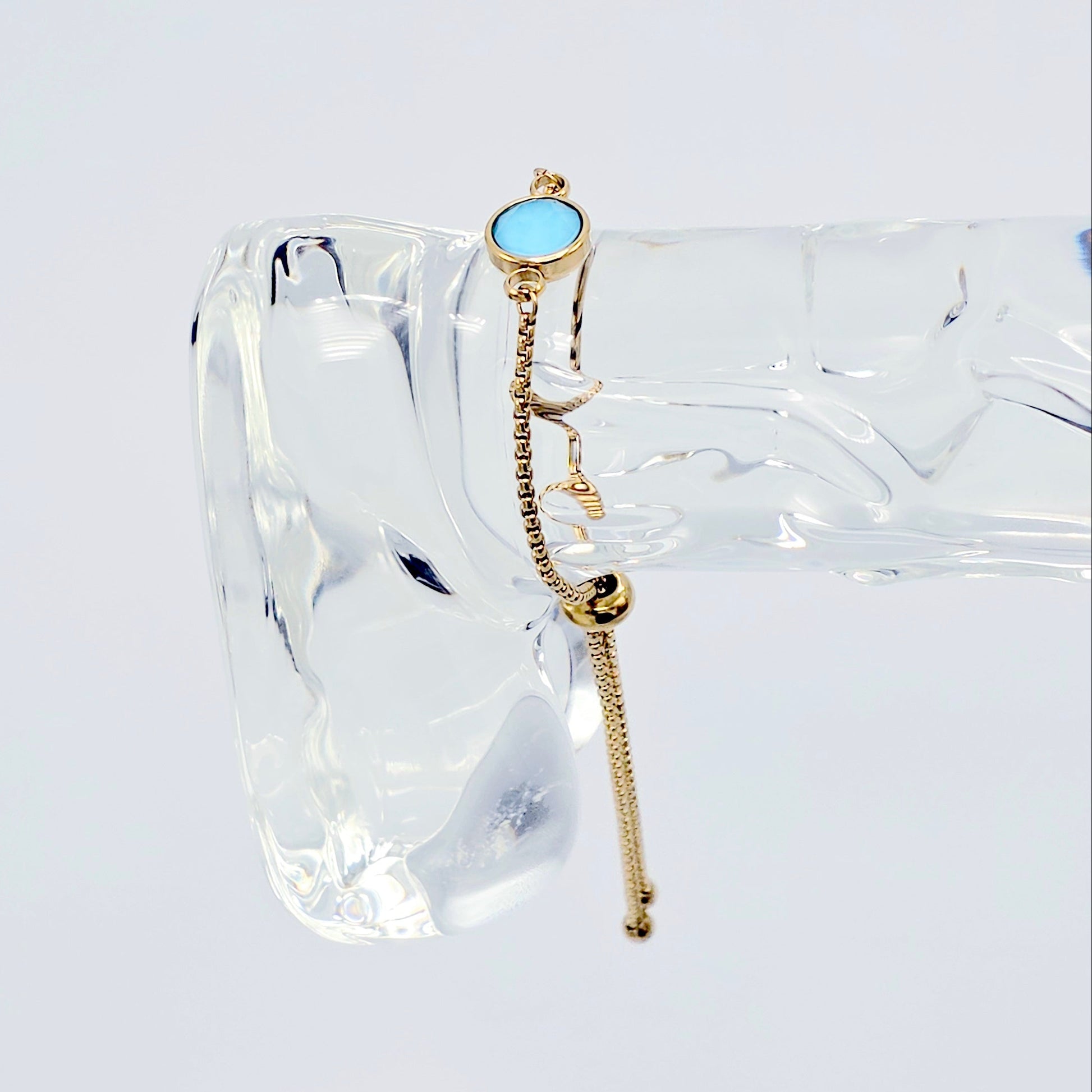 Gold Penis Noose Bracelet with Blue Gemstone