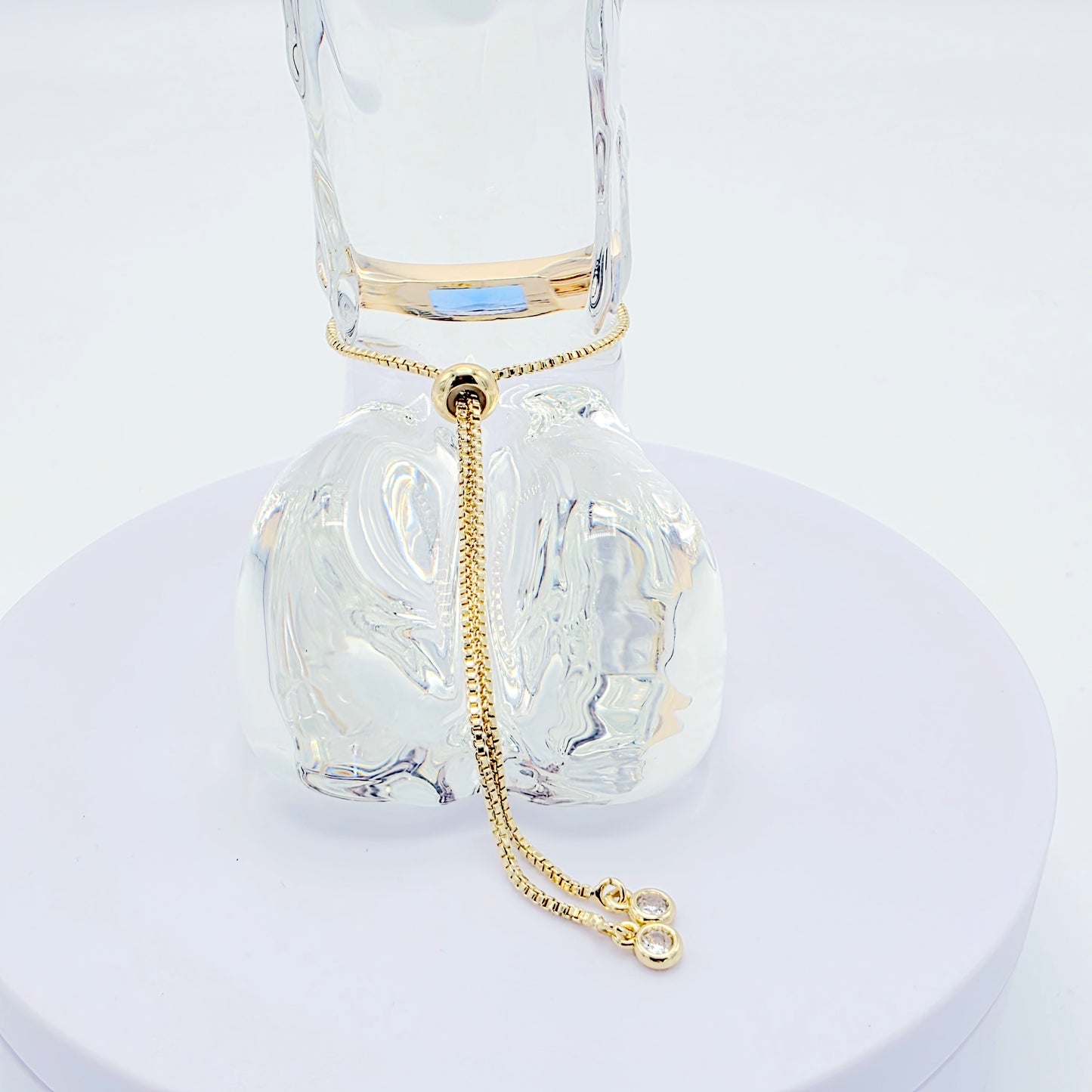 18k Gold Penis Noose Bracelet with Bright Blue Gem.
