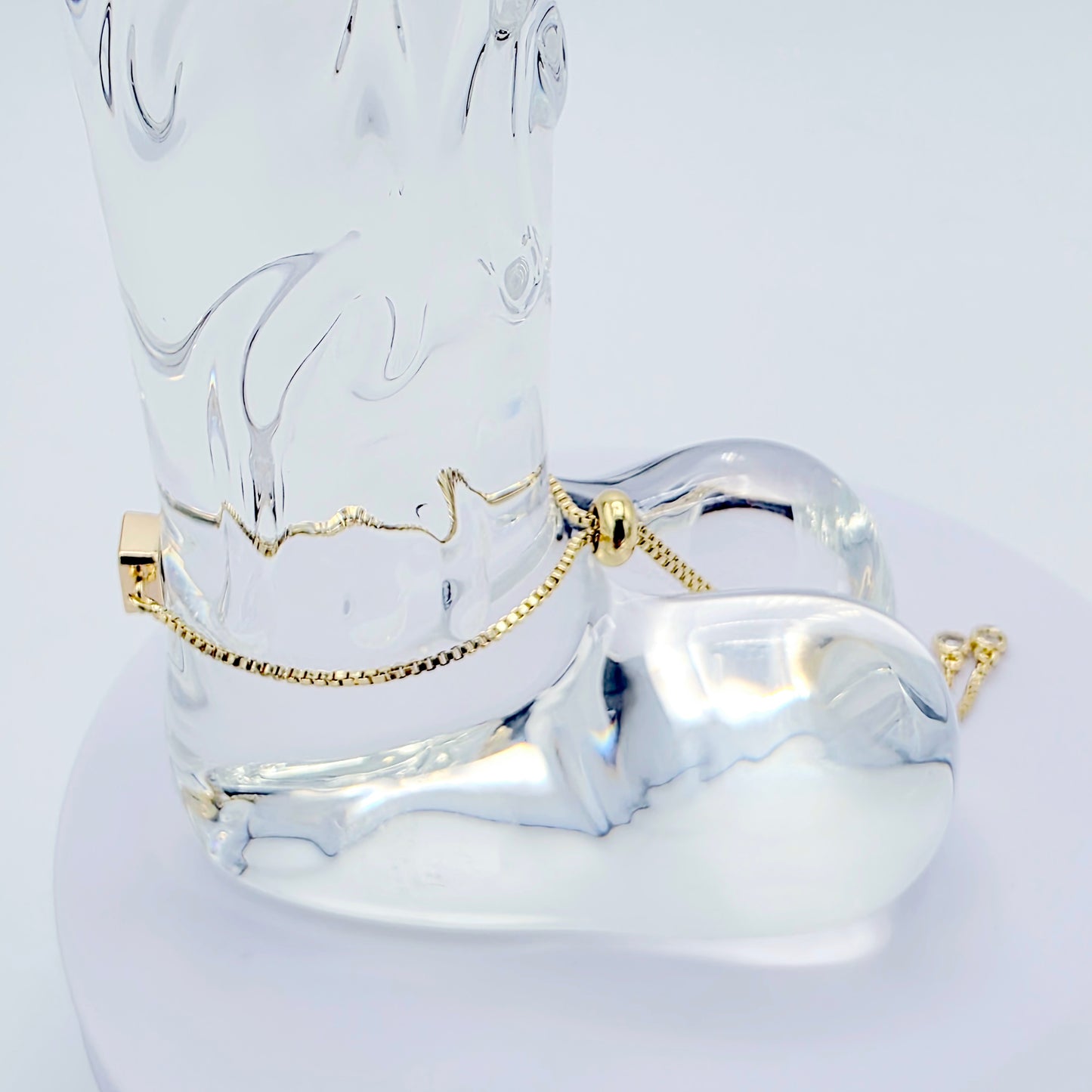 18k Gold Penis Noose Bracelet with Bright Blue Gem.