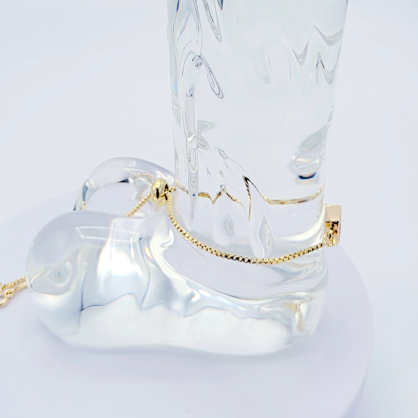 18k Gold Penis Noose Bracelet with Bright Blue Gem.