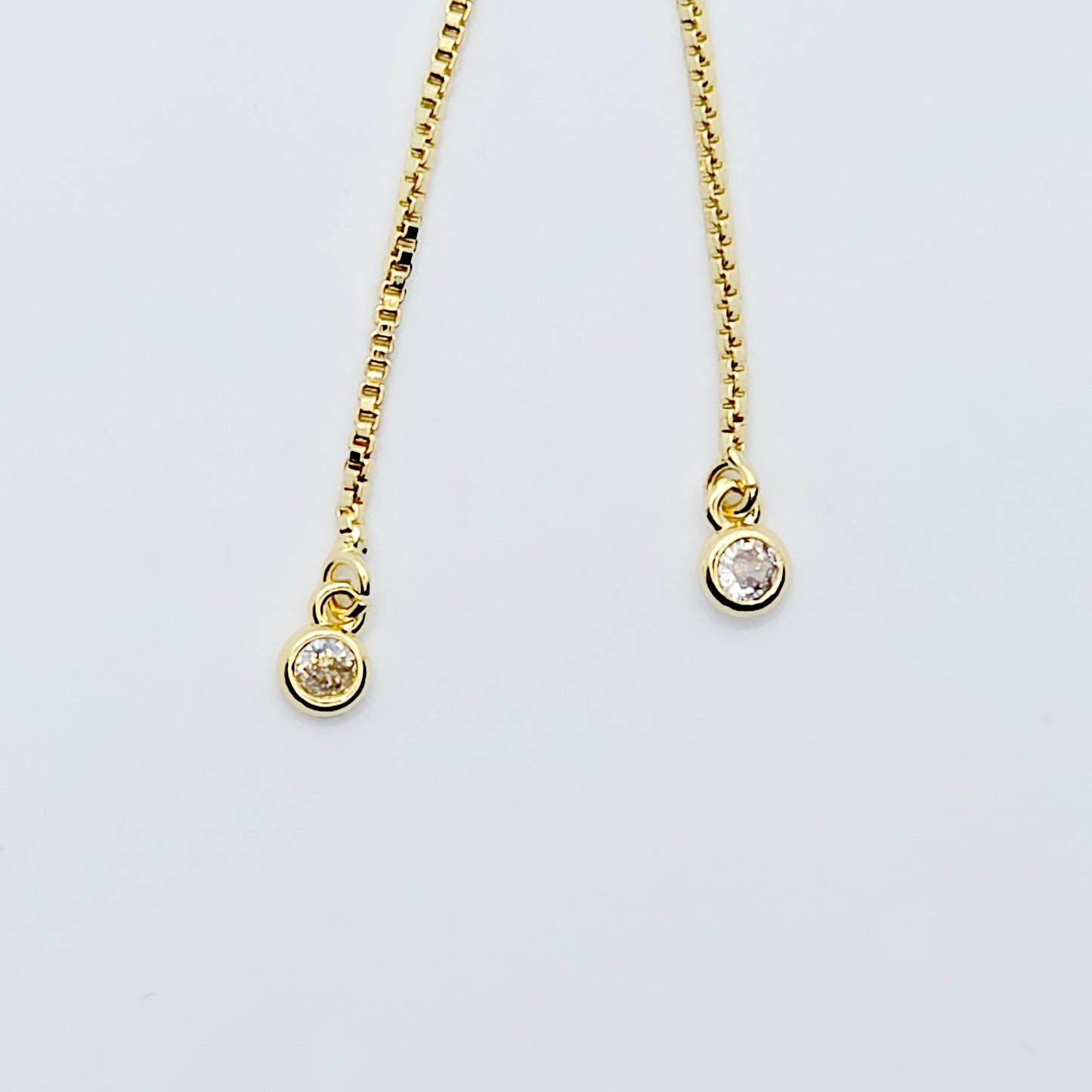 18k Gold Penis Noose Bracelet with Bright Blue Gem.