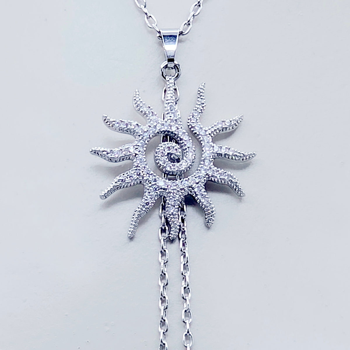 Necklace to Nipple, Platinum, with Spiral CZ Sun and Your Choice of Attachment.