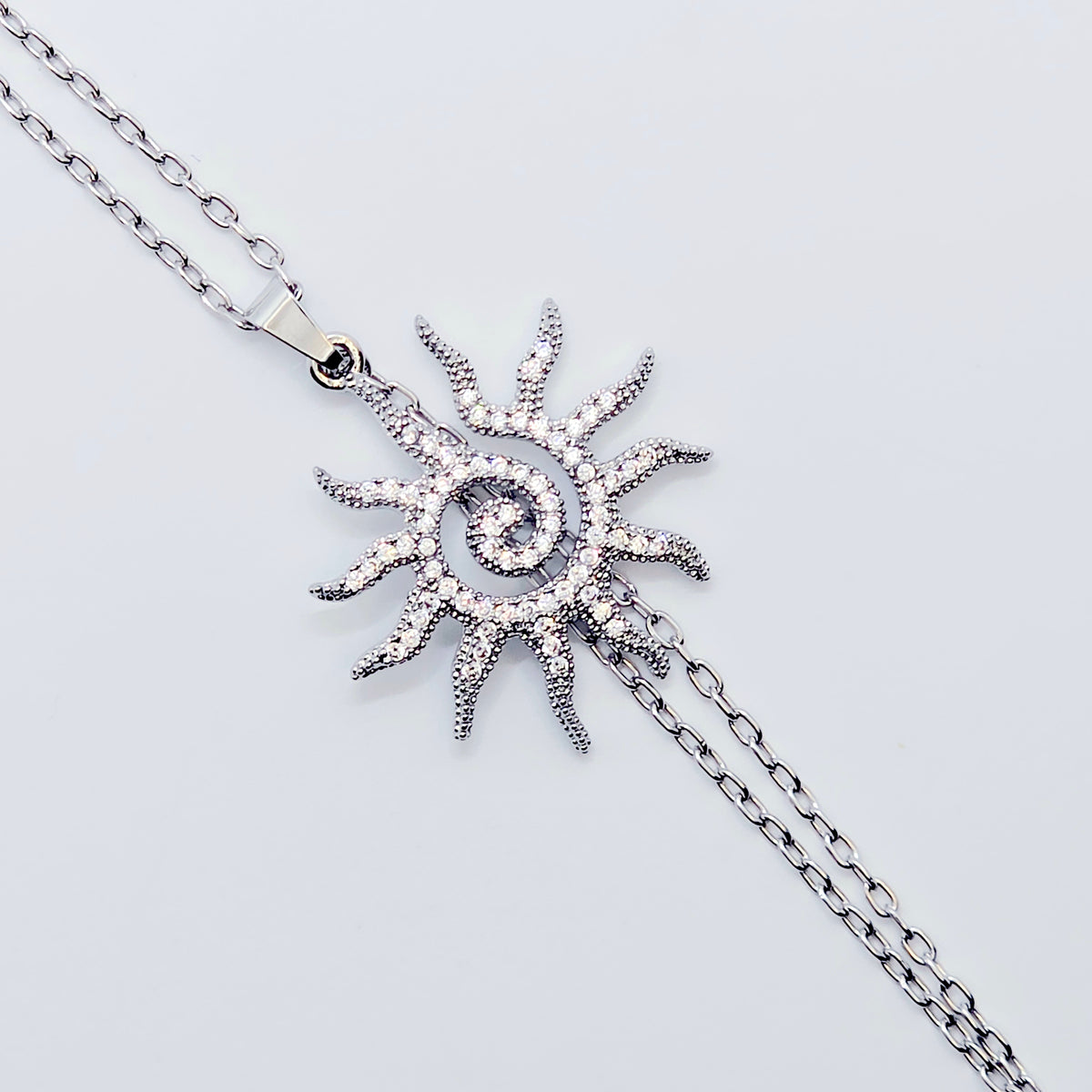 Necklace to Nipple, Platinum, with Spiral CZ Sun and Your Choice of Attachment.