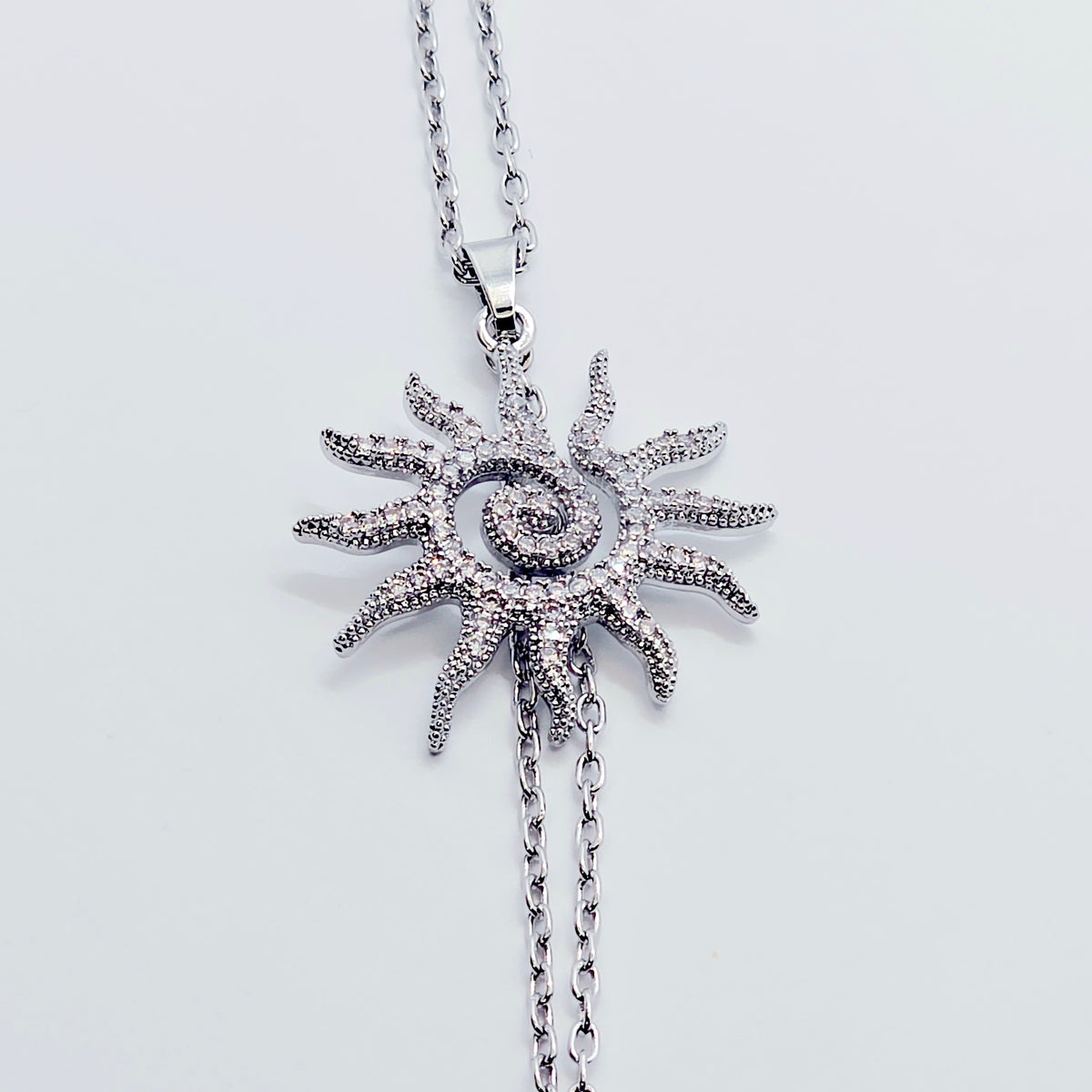 Necklace to Nipple, Platinum, with Spiral CZ Sun and Your Choice of Attachment.