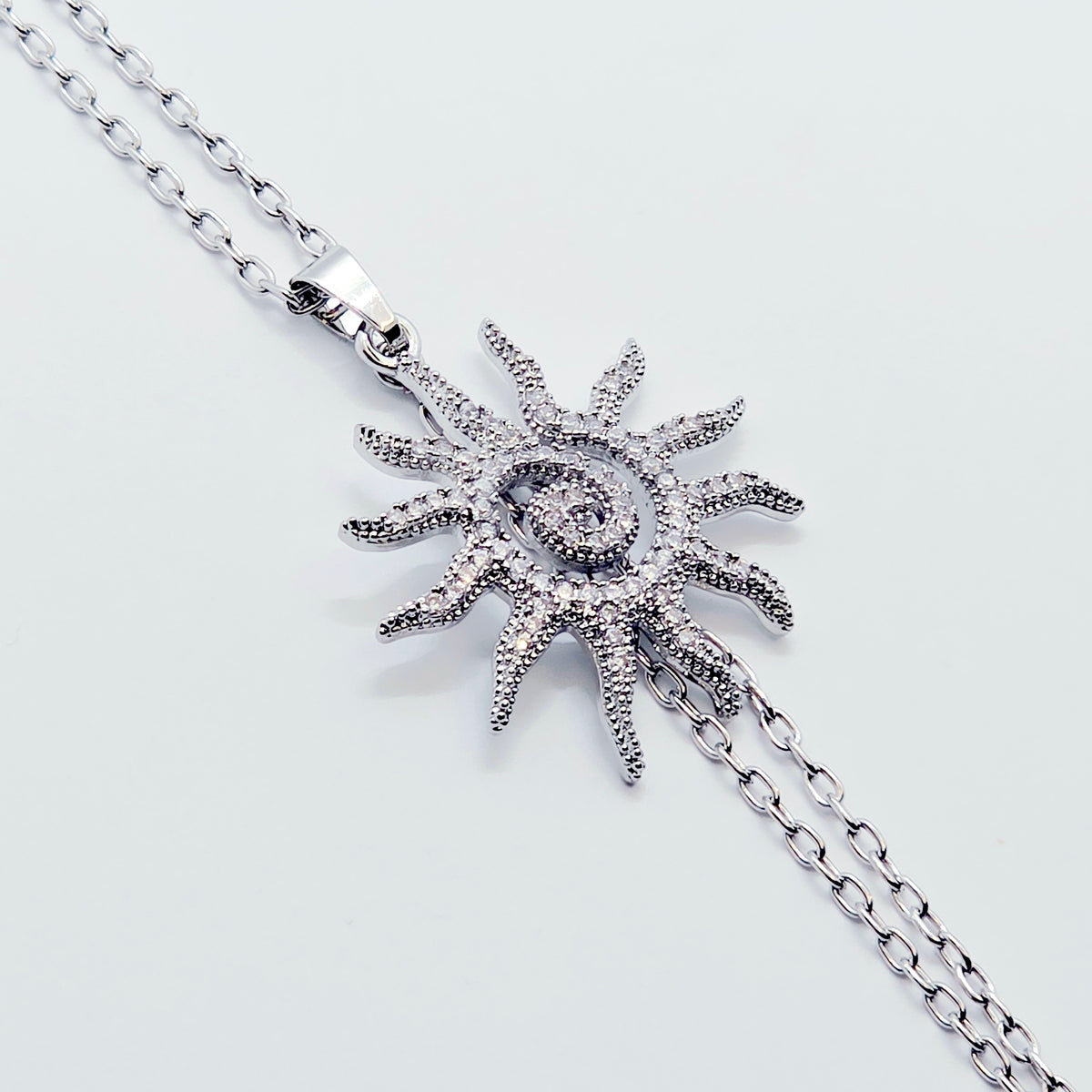Necklace to Nipple, Platinum, with Spiral CZ Sun and Your Choice of Attachment.