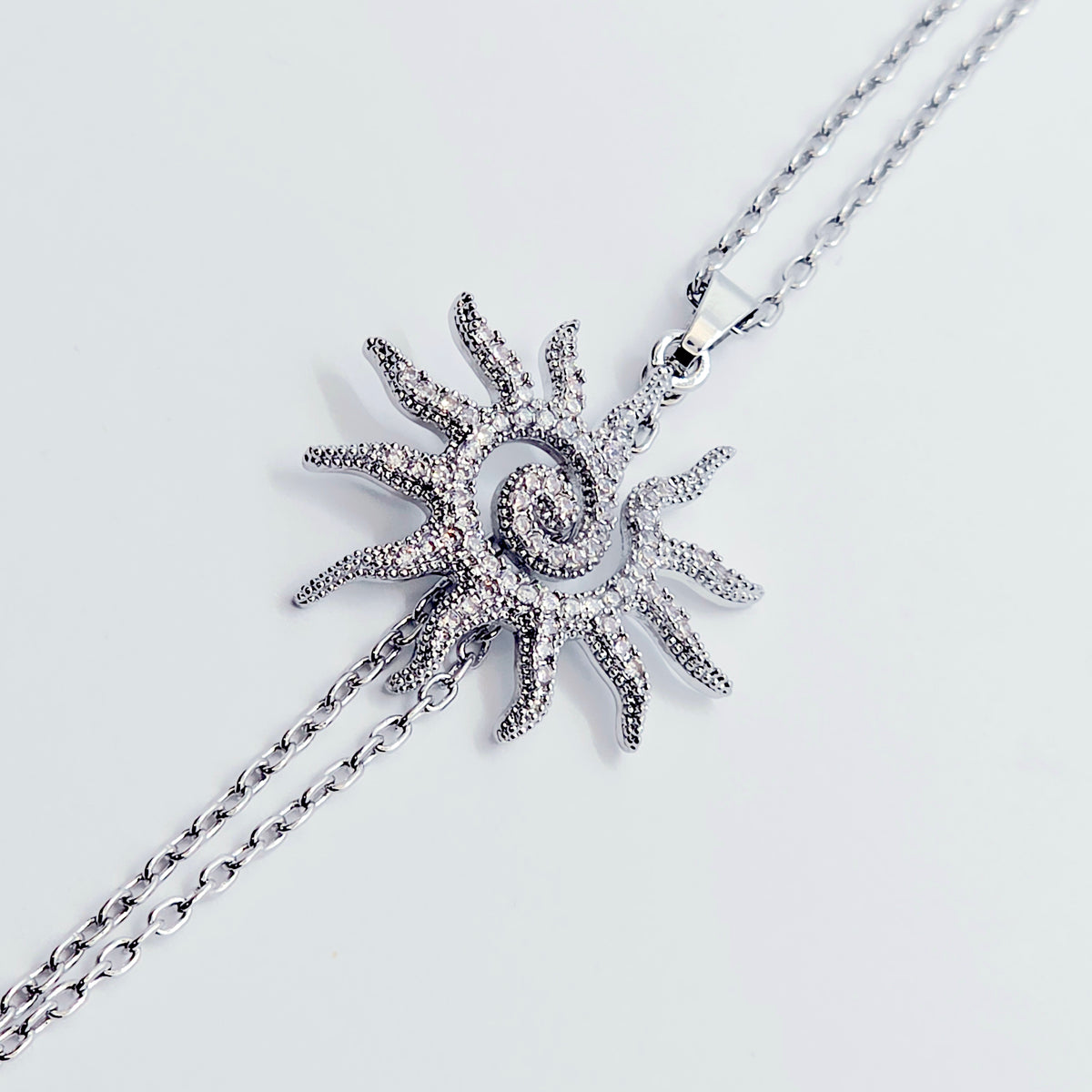 Necklace to Nipple, Platinum, with Spiral CZ Sun and Your Choice of Attachment.