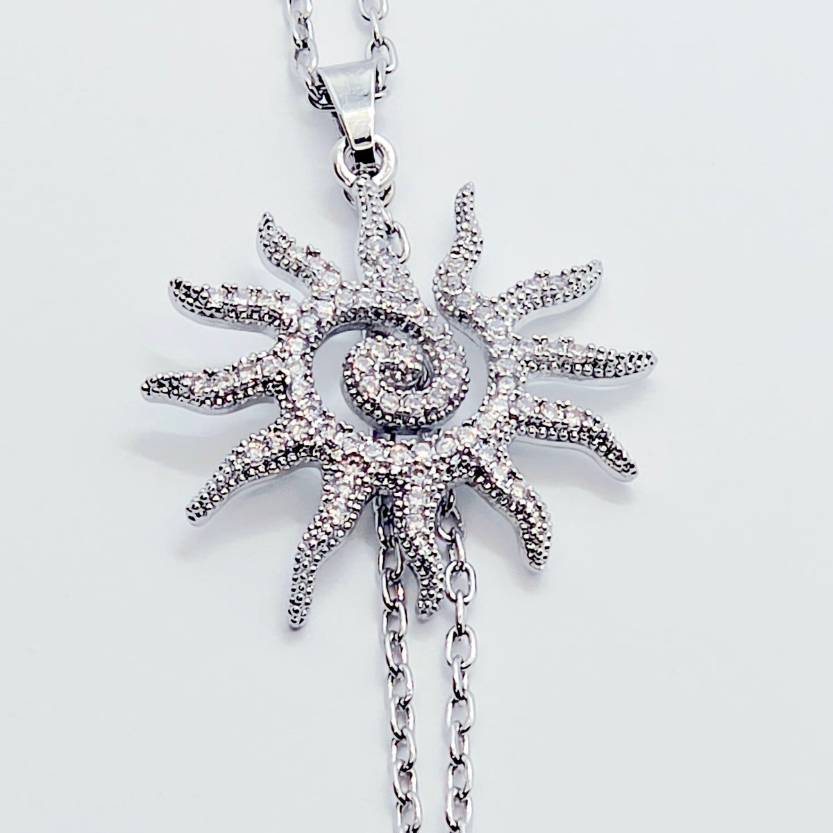Necklace to Nipple, Platinum, with Spiral CZ Sun and Your Choice of Attachment.