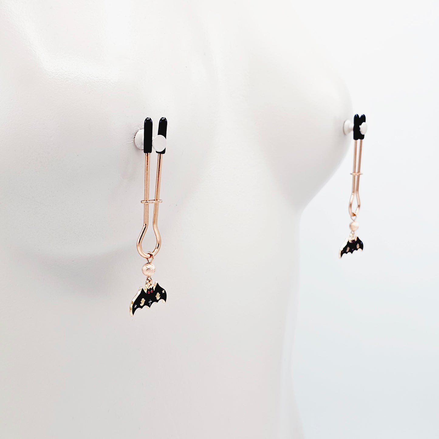 Spooky Nipple Clamps for Halloween. Rose Gold Straight Tweezer Clamps with Bats.