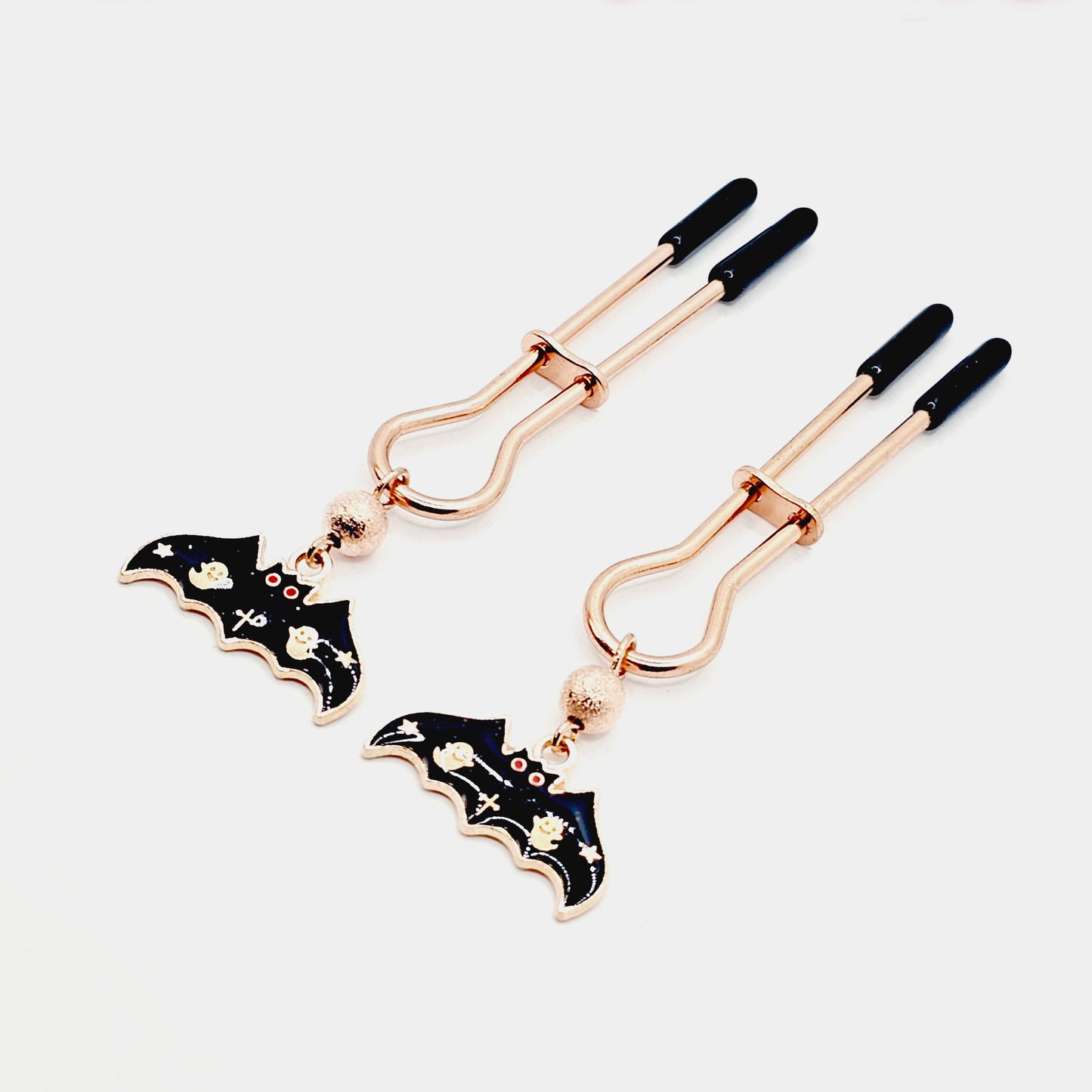 Spooky Nipple Clamps for Halloween. Rose Gold Straight Tweezer Clamps with Bats.