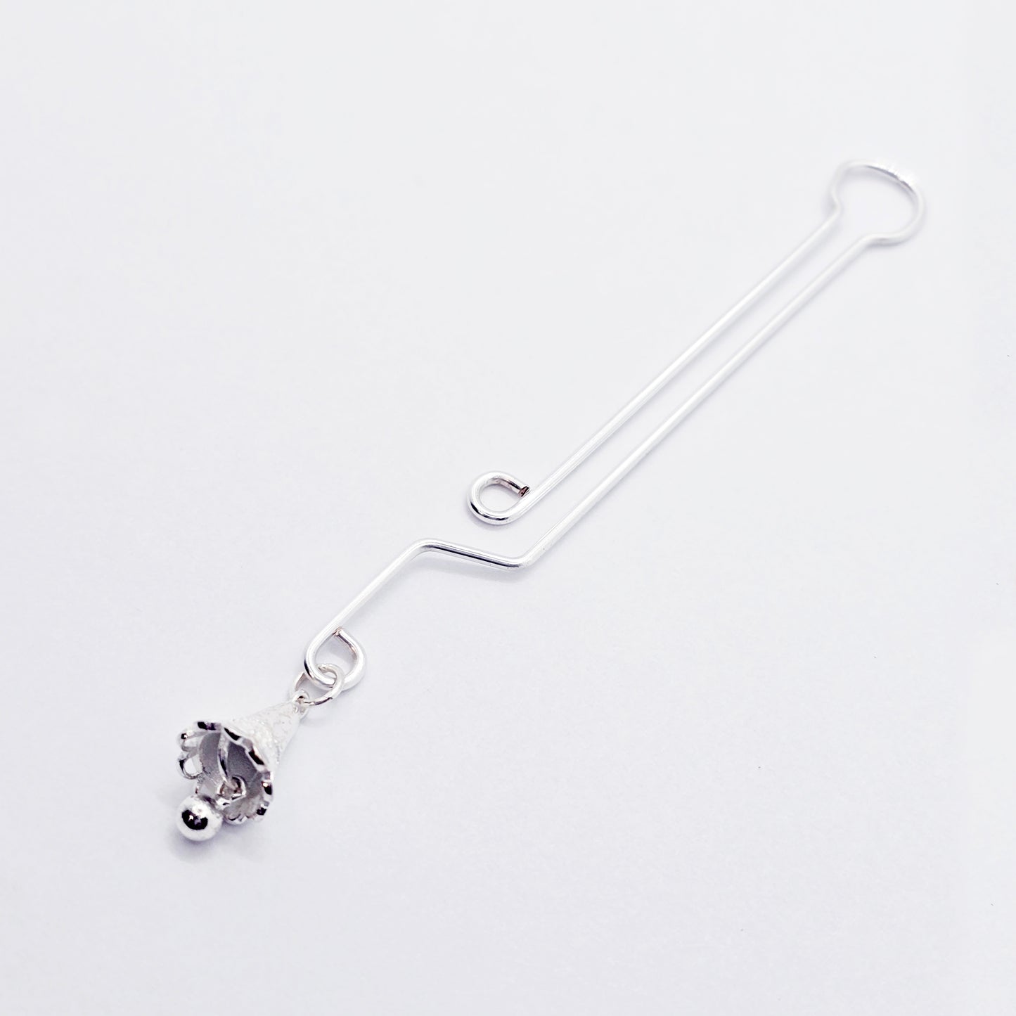 Labia Clip with Sterling Silver Bell Pendant.