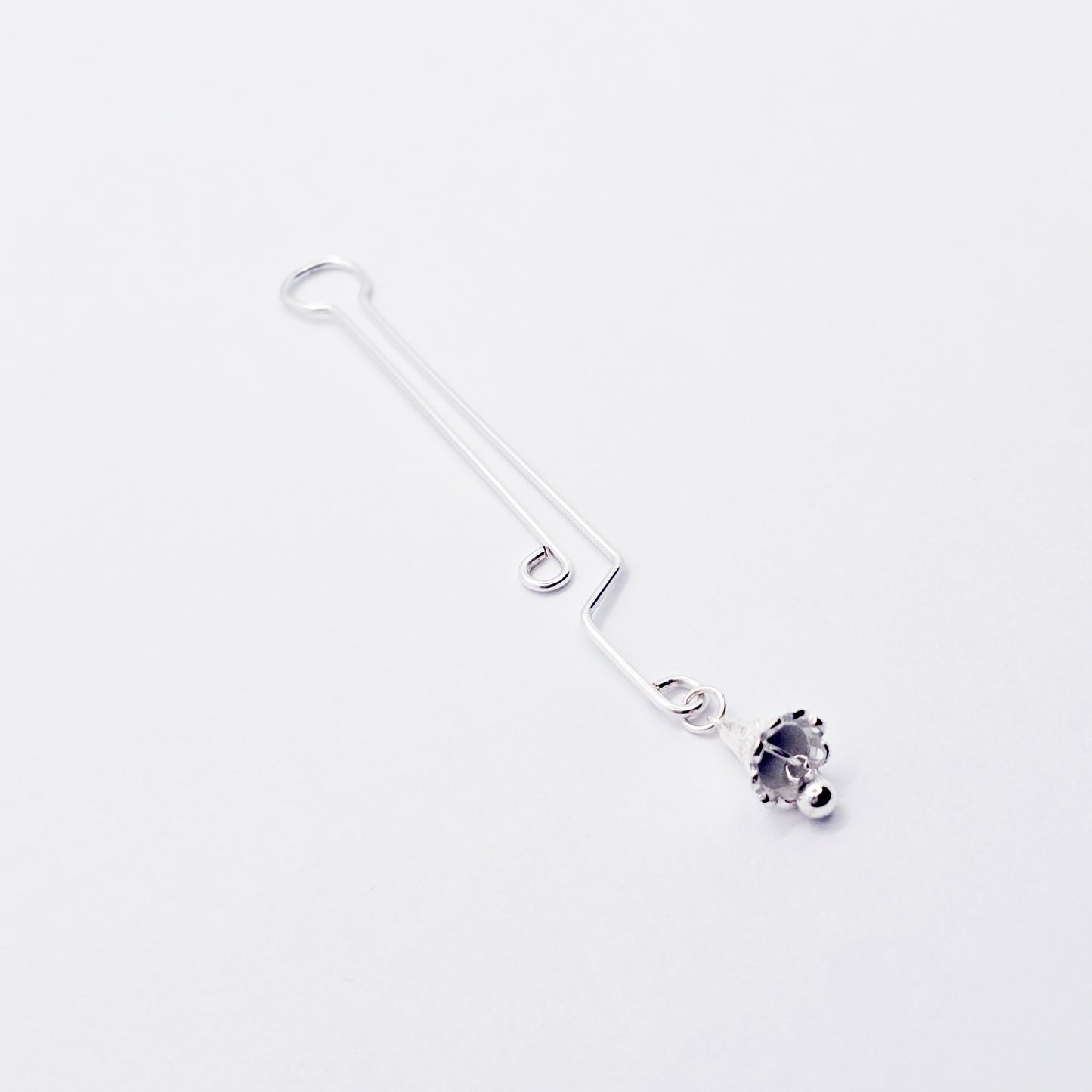 Labia Clip with Sterling Silver Bell Pendant.