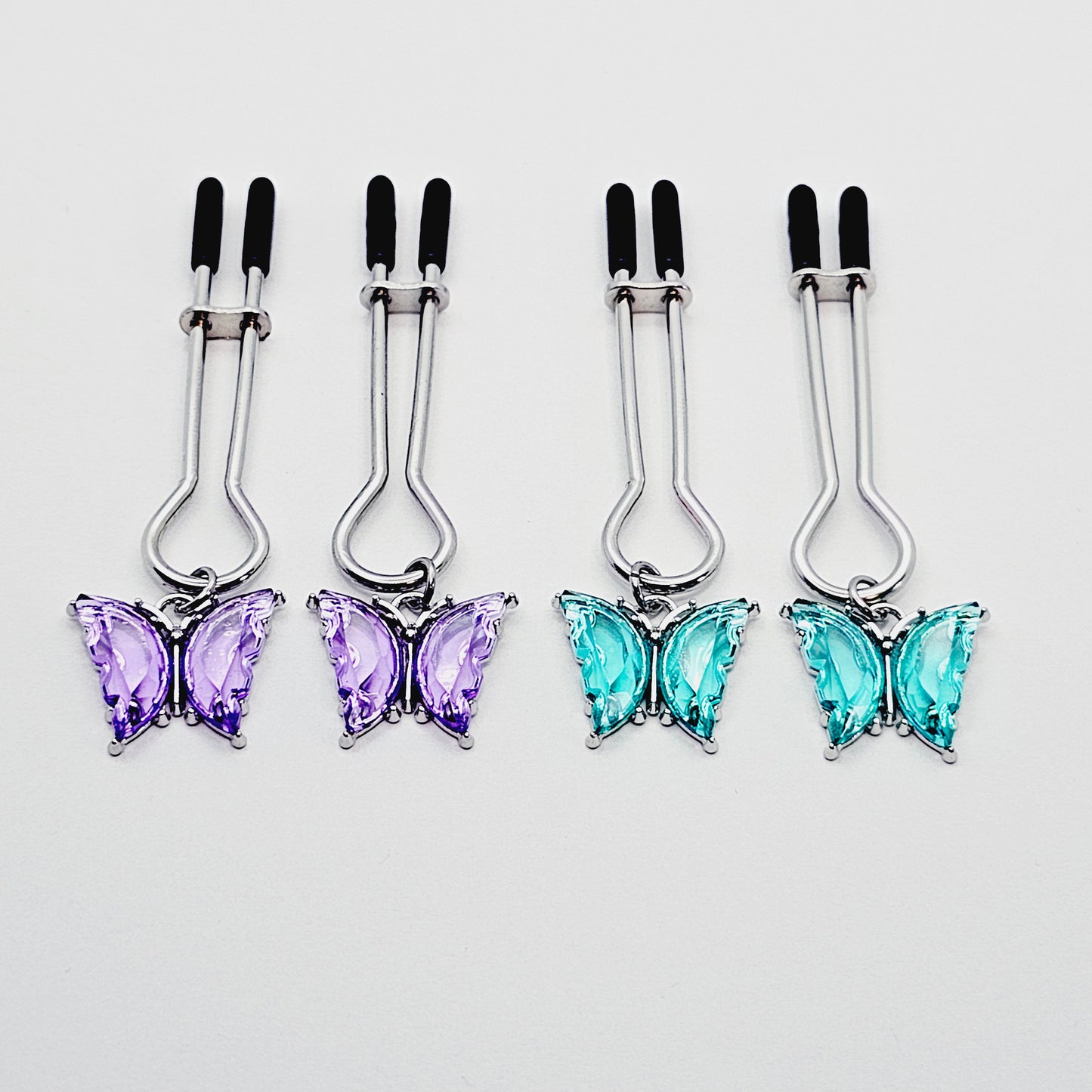 Nipple Clamps with Purple or Teal Butterflies. Adjustable Straight Tweezer Clamps.