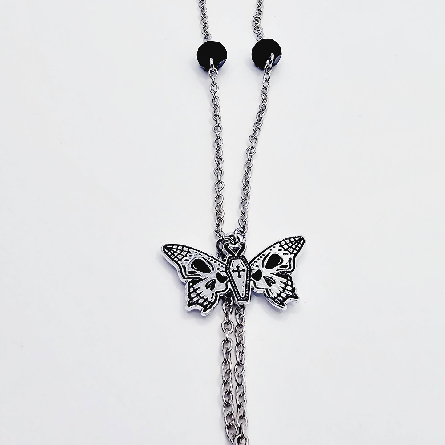 Necklace to Nipple with Butterfly Skulls and Black Crystals, with Non Piercing Nipple Nooses, Rings, or Nipple Clamp Options.