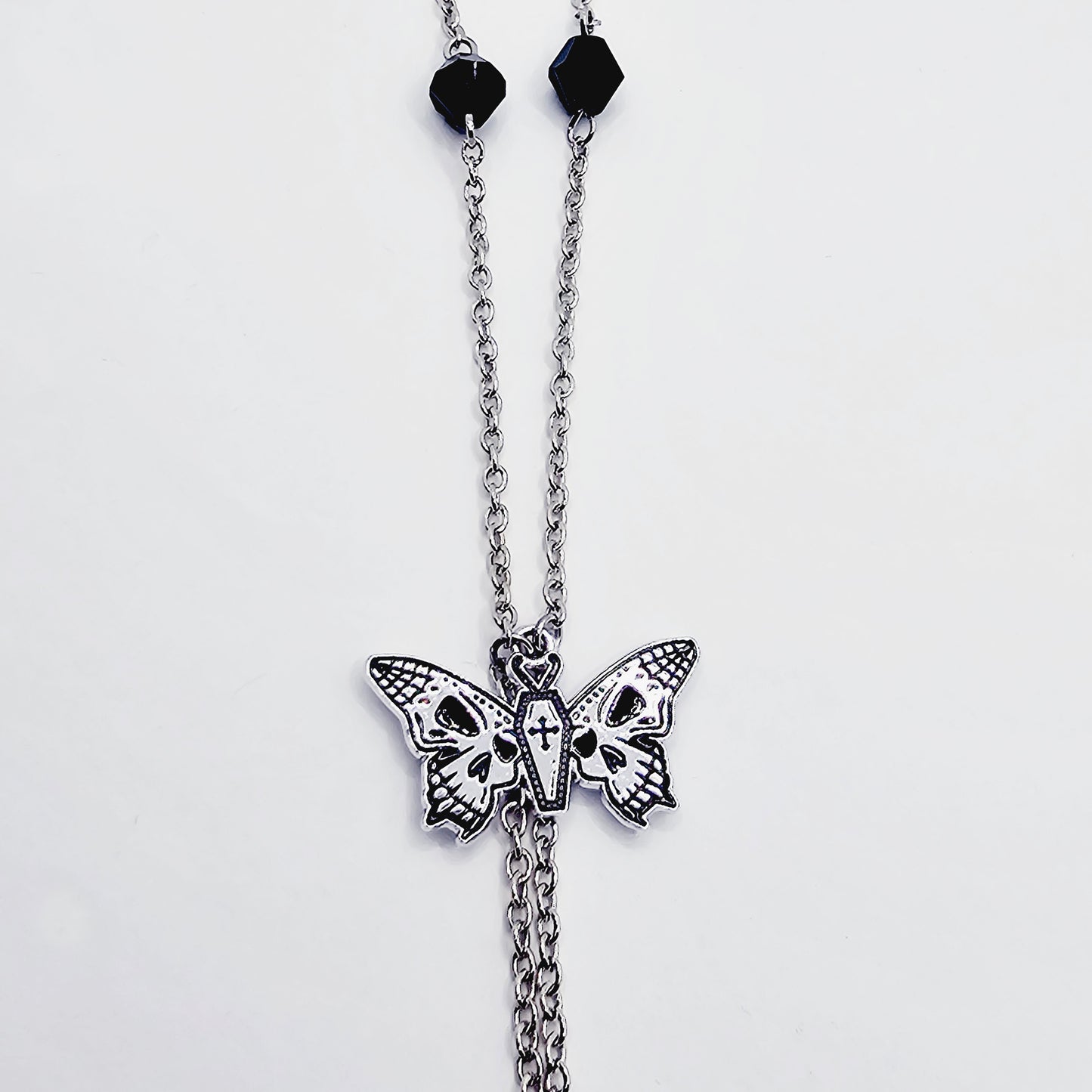 Necklace to Nipple with Butterfly Skulls and Black Crystals, with Non Piercing Nipple Nooses, Rings, or Nipple Clamp Options.