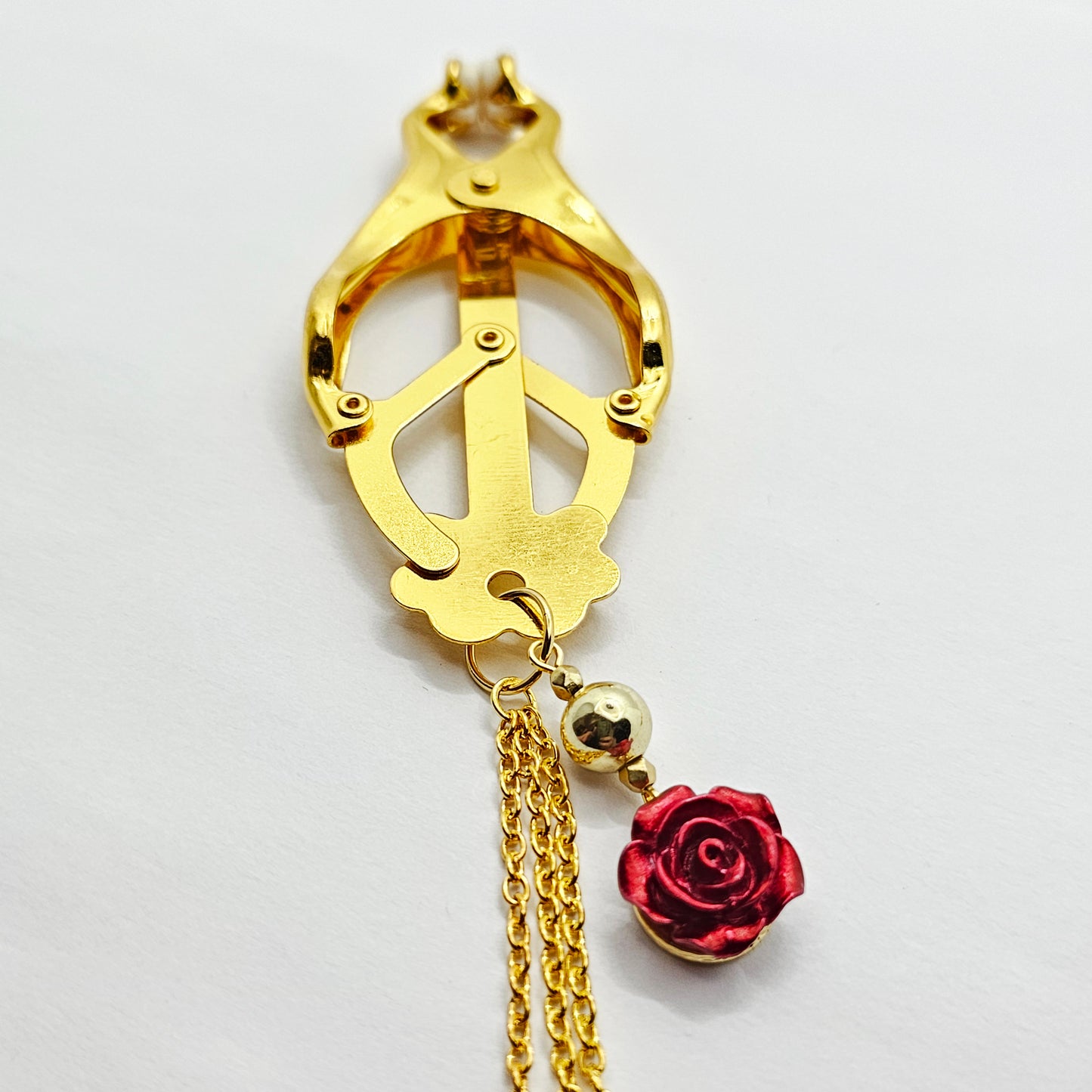 Gold Clover Clamps with Multi Chains Attached and Red Roses.