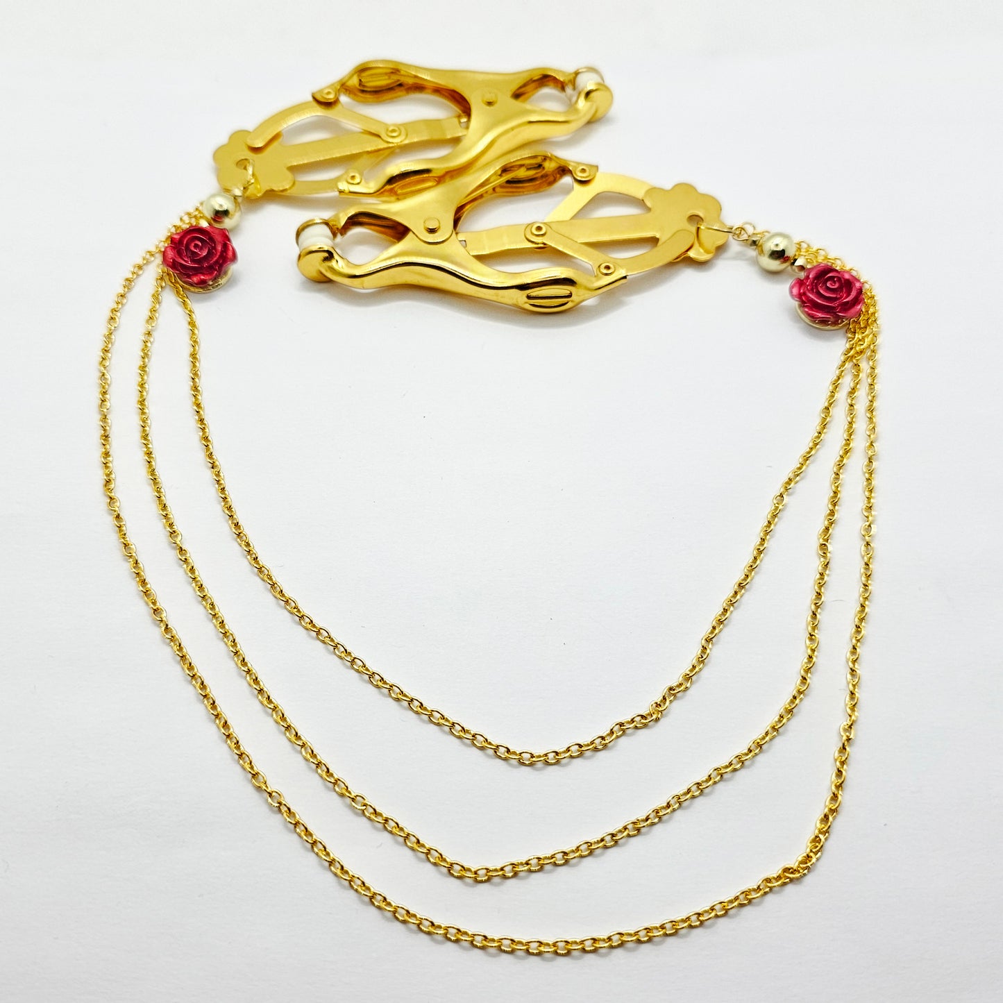 Gold Clover Clamps with Multi Chains Attached and Red Roses.