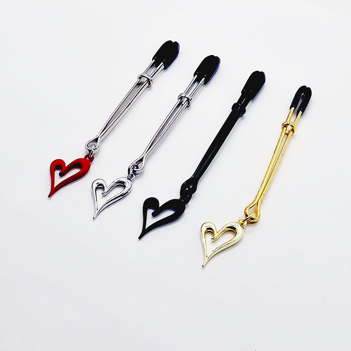 Clit Clamp, with Heart in Gold, Black, Red or Silver. Tweezer Clitoral Clamp.