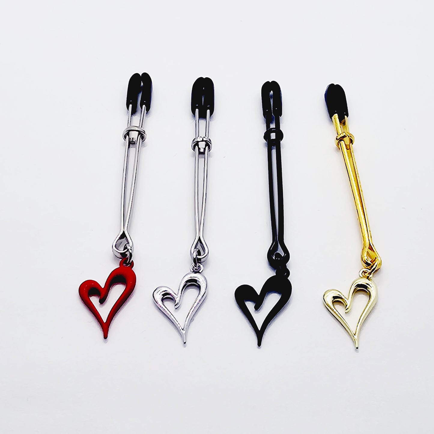 Clit Clamp, with Heart in Gold, Black, Red or Silver. Tweezer Clitoral Clamp.