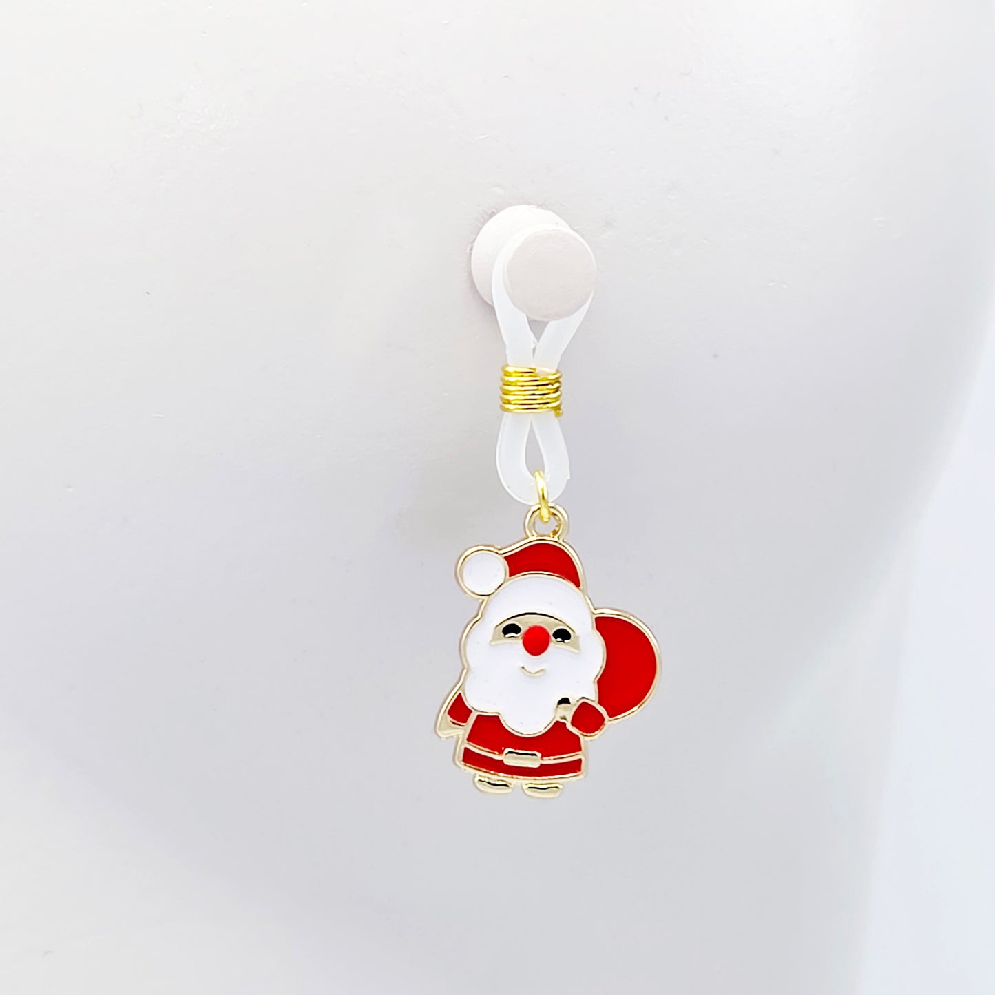 Pair of Santa Claus nipple nooses on a white background