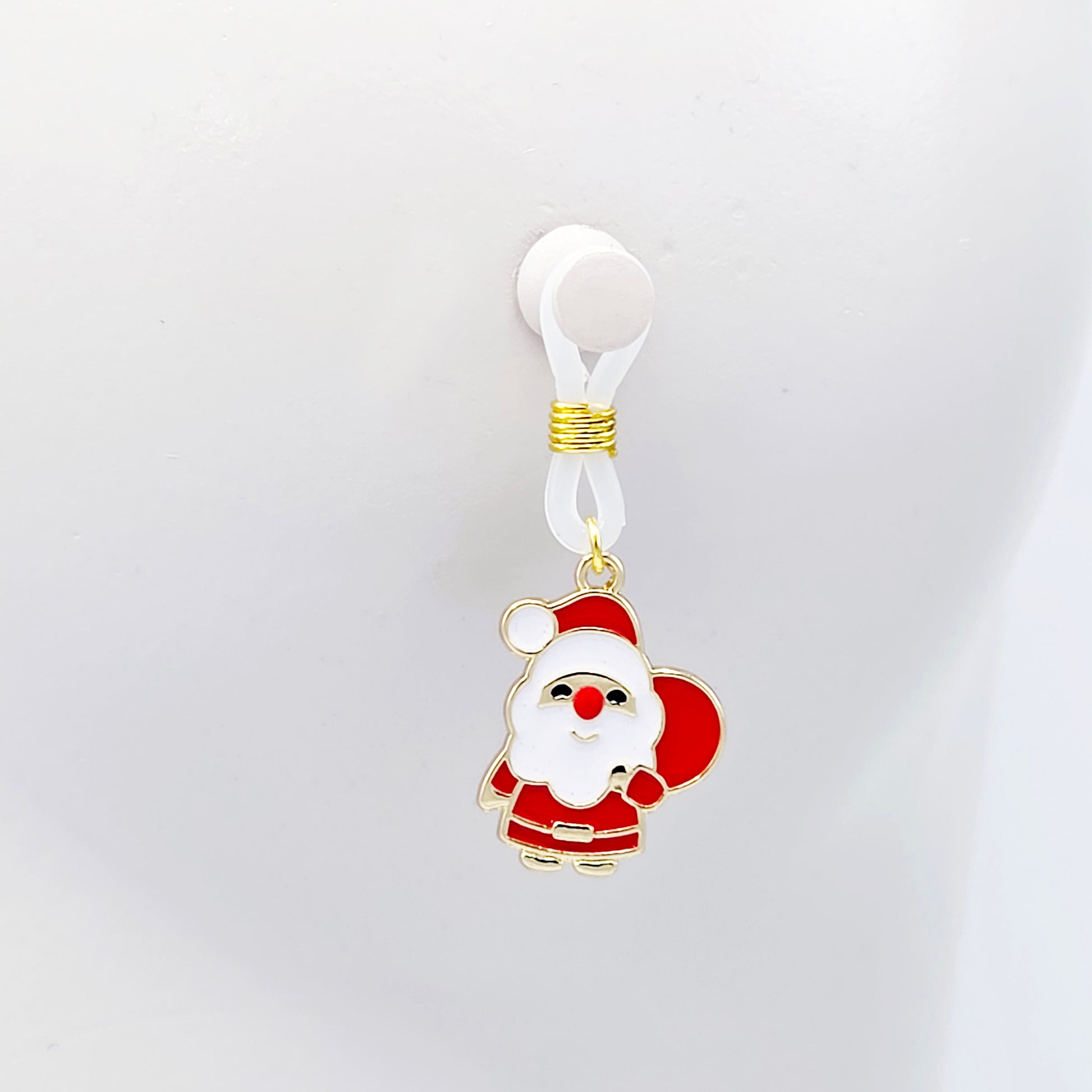 Pair of Santa Claus nipple nooses on a white background