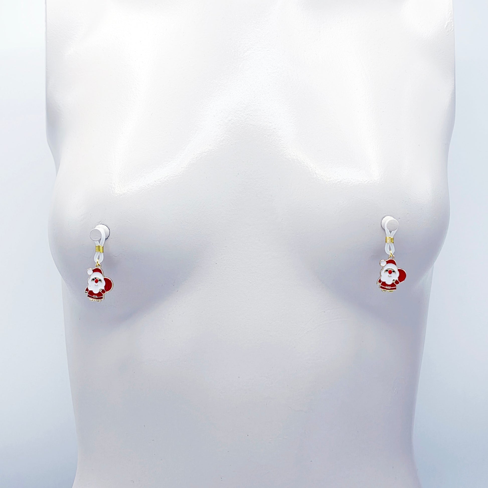 Pair of Santa Claus nipple nooses on a white background