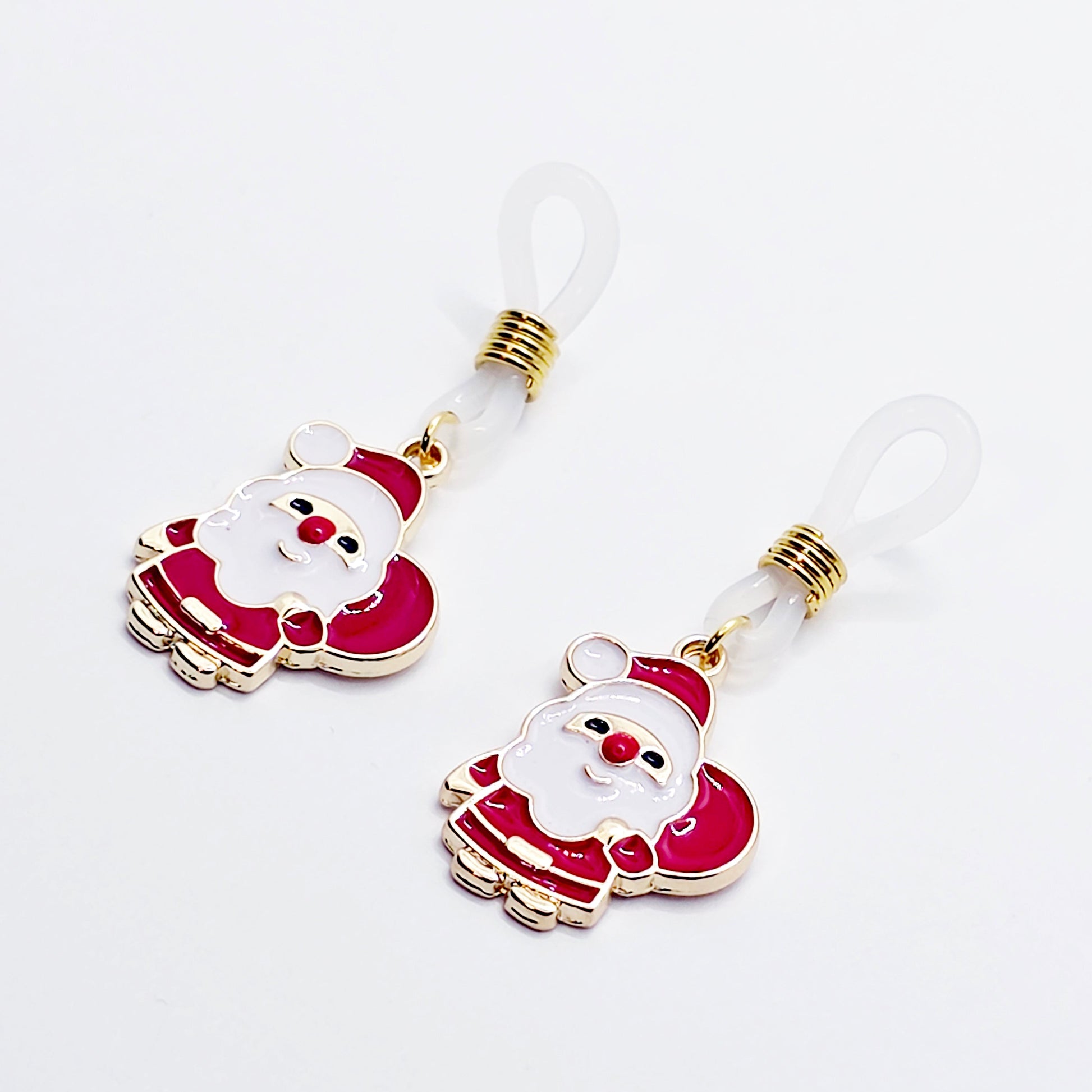 Pair of Santa Claus nipple nooses on a white background