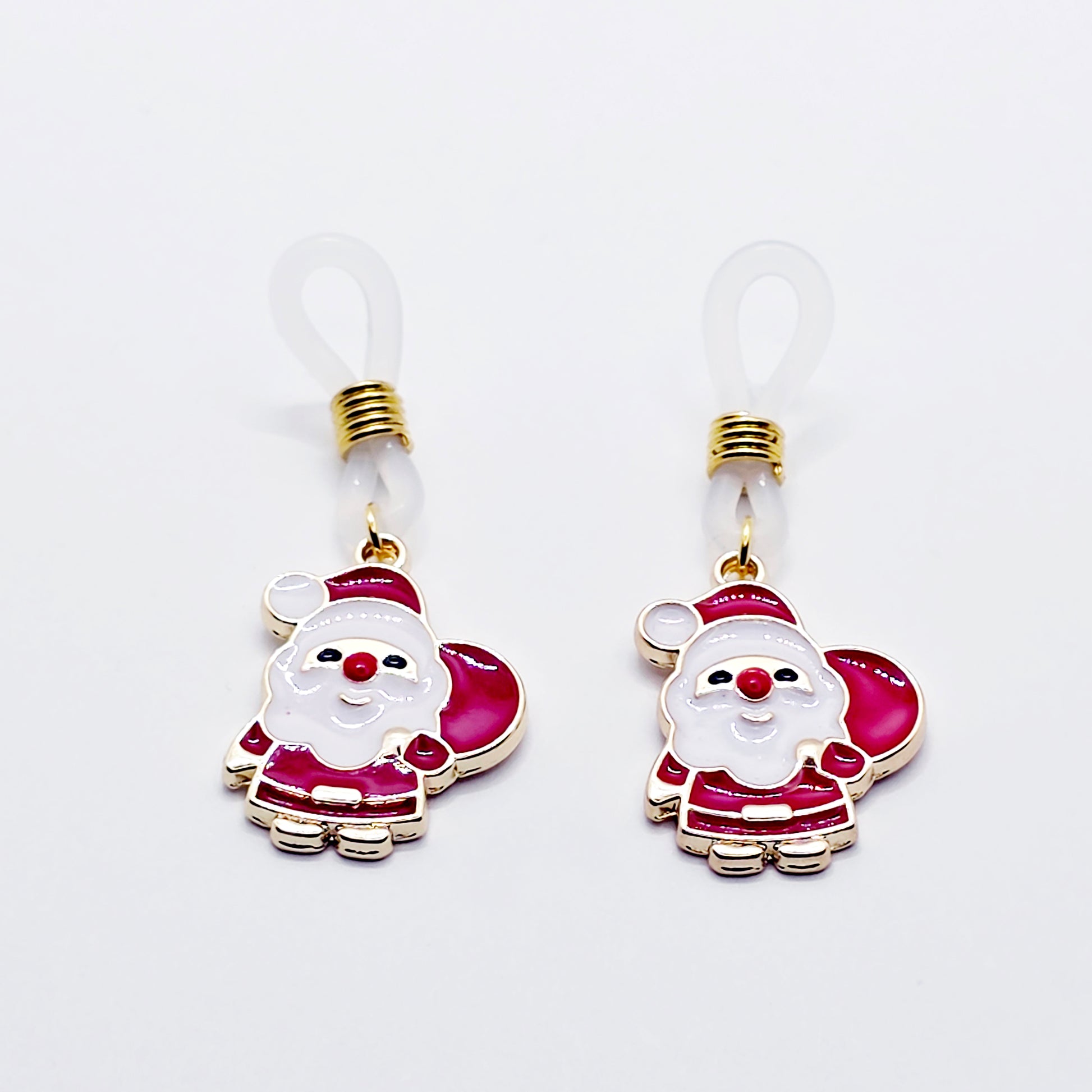 Pair of Santa Claus nipple nooses on a white background