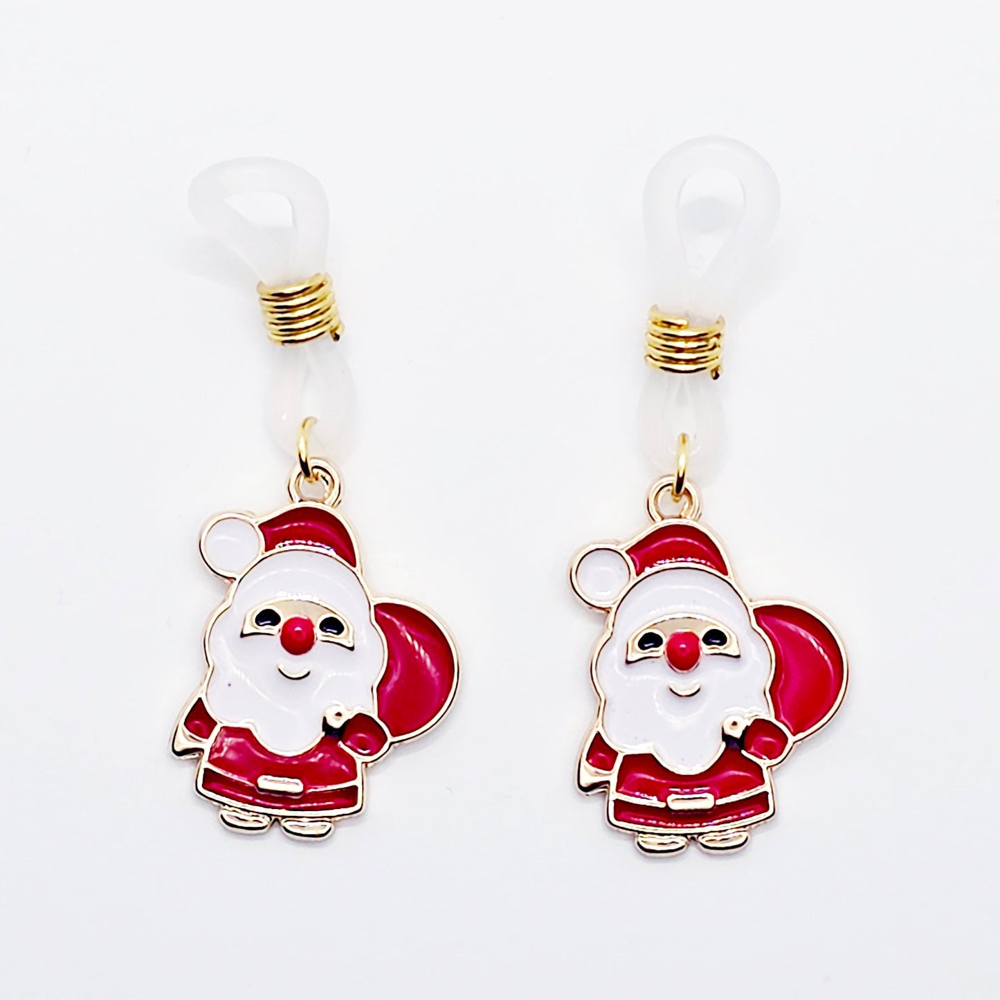 Pair of Santa Claus nipple nooses on a white background